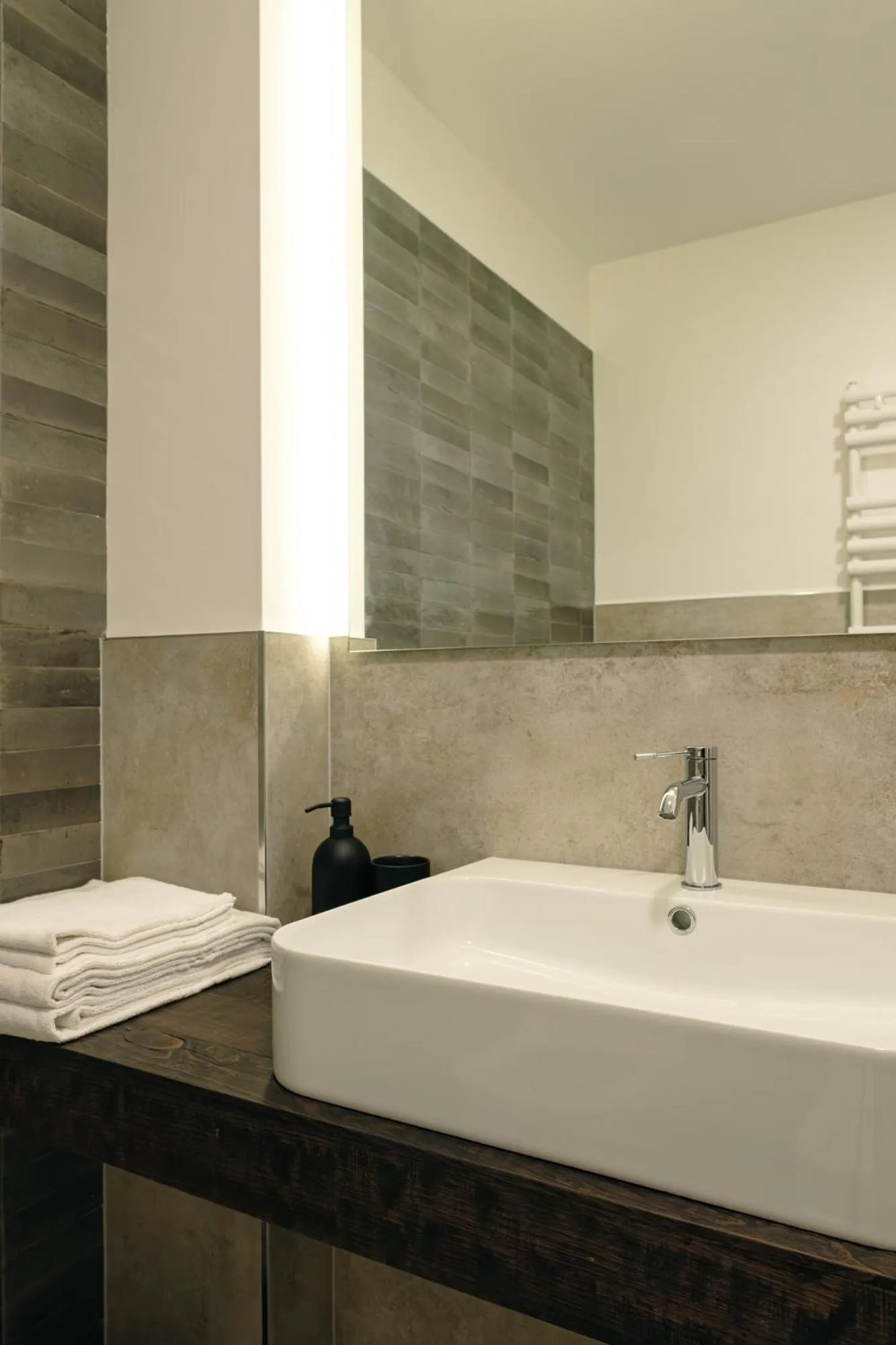 Bathroom in Camoma Aparthotel - Suites Apartments