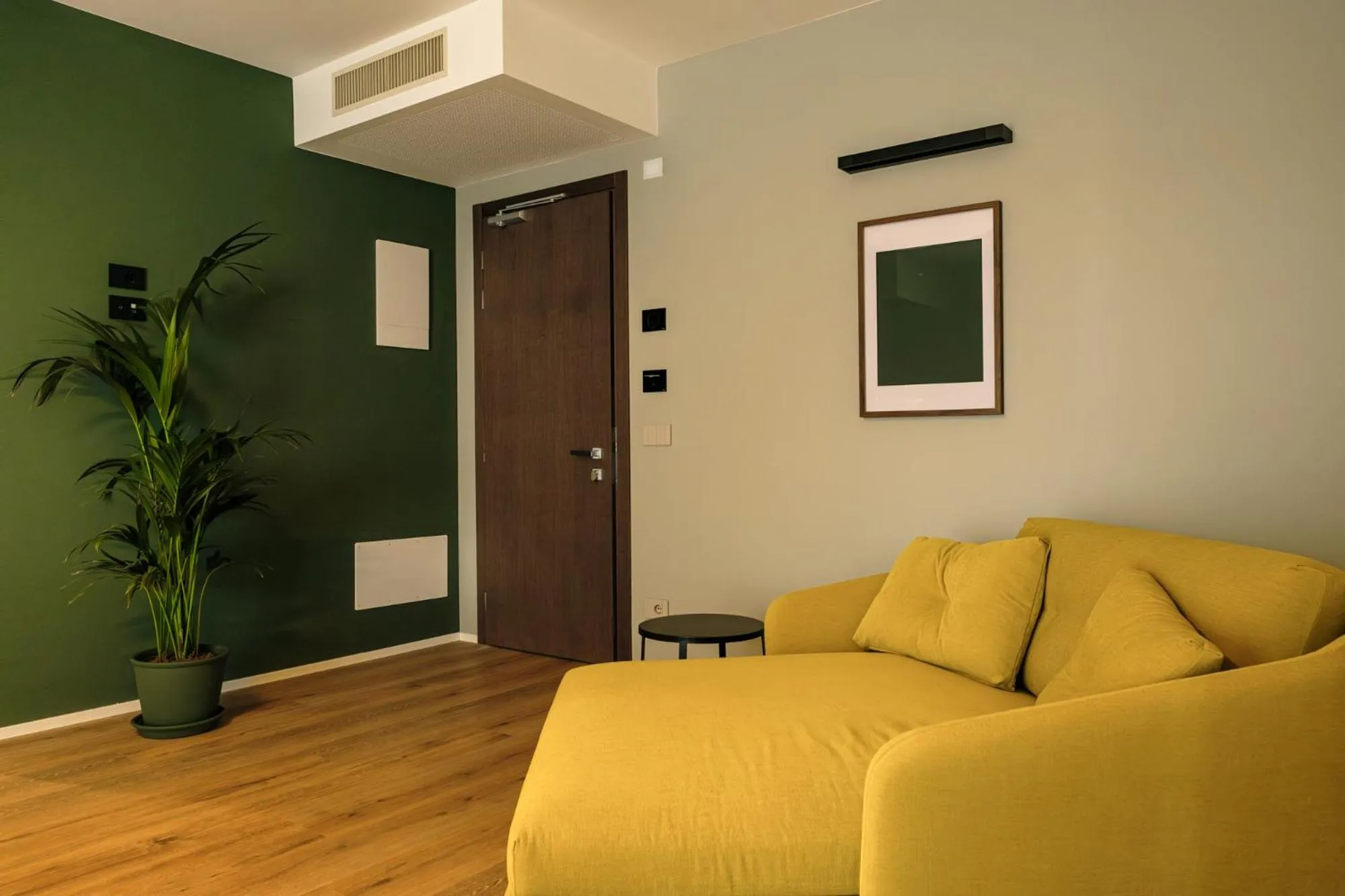 Living room in Camoma Aparthotel - Suites Apartments