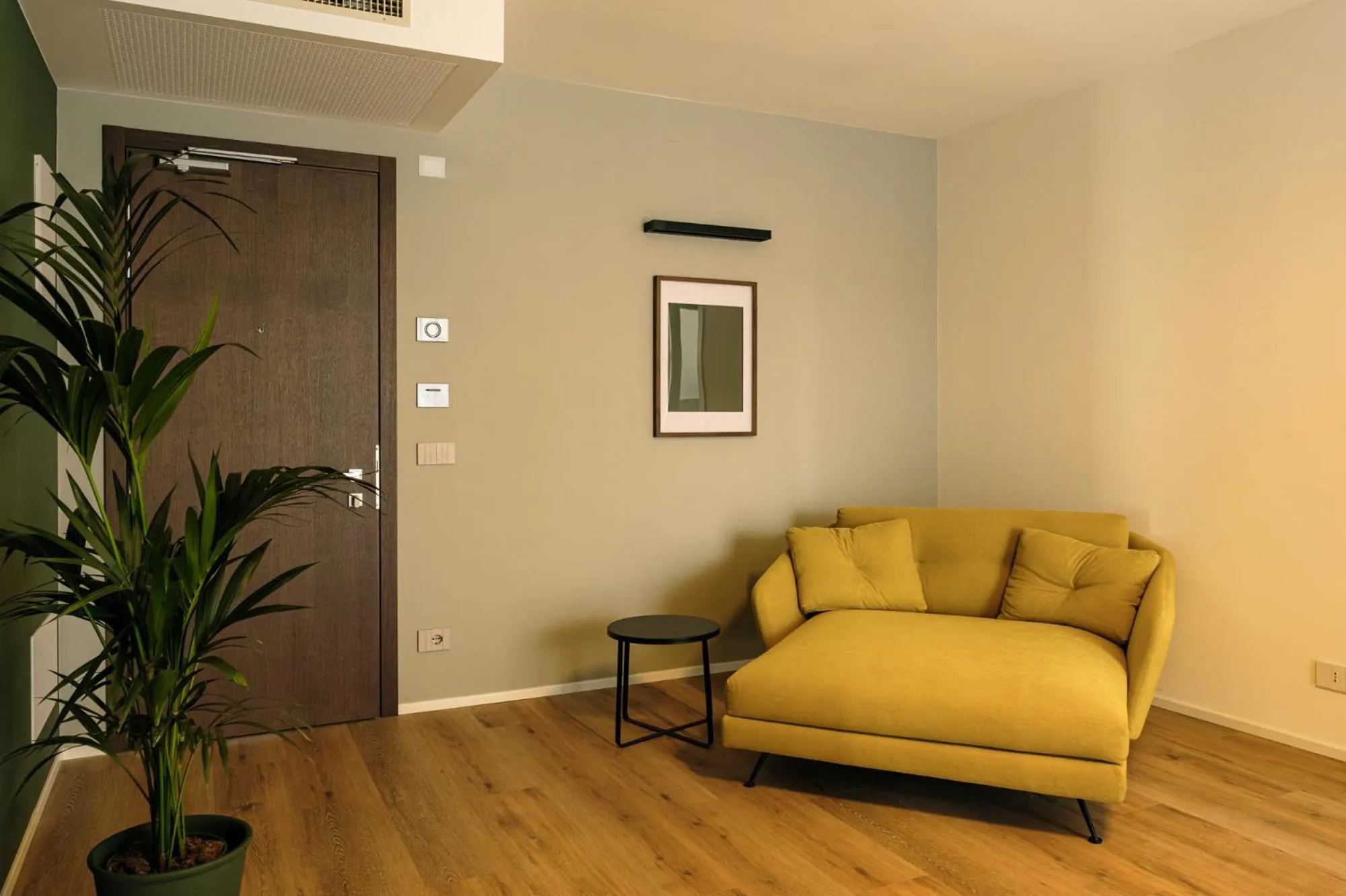 Living room in Camoma Aparthotel - Suites Apartments