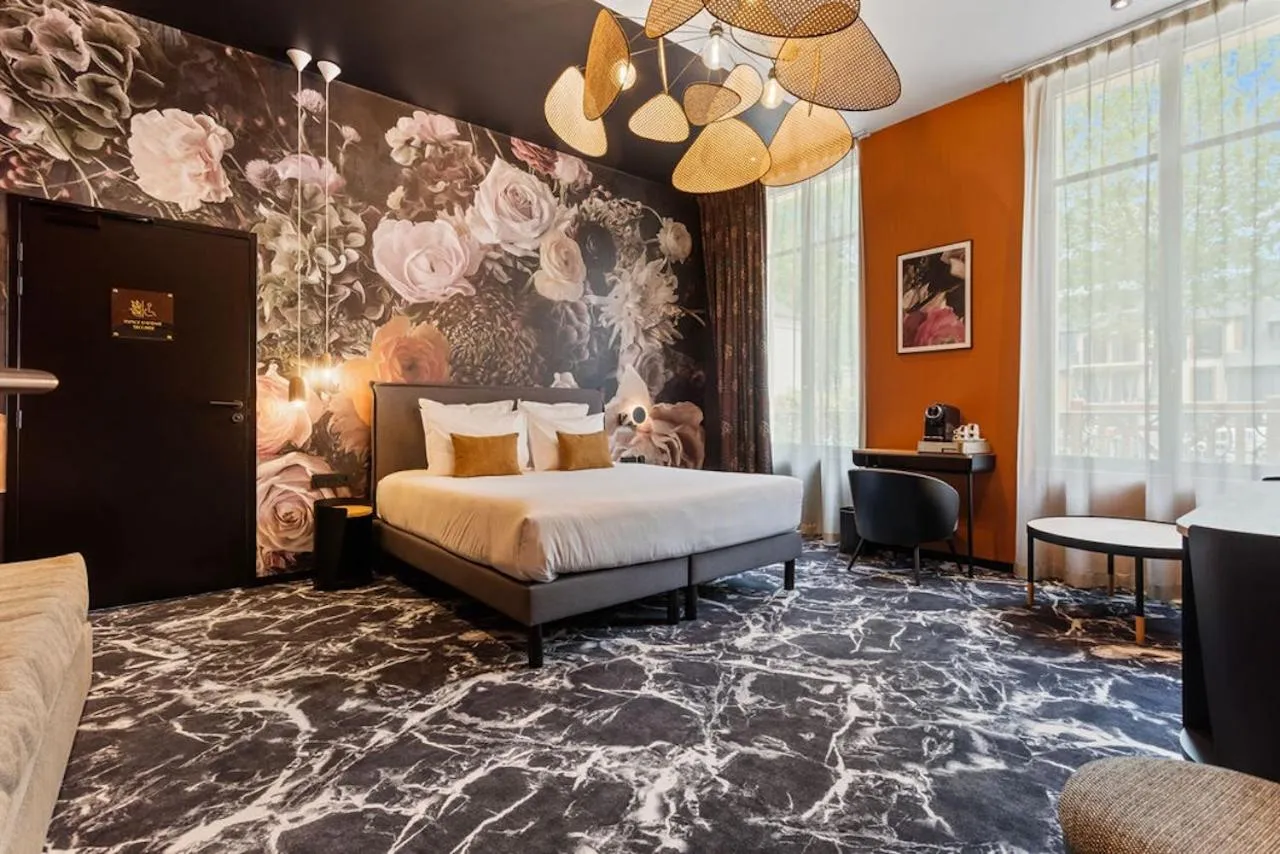 Bed in LE RITUEL HOTEL & SPA