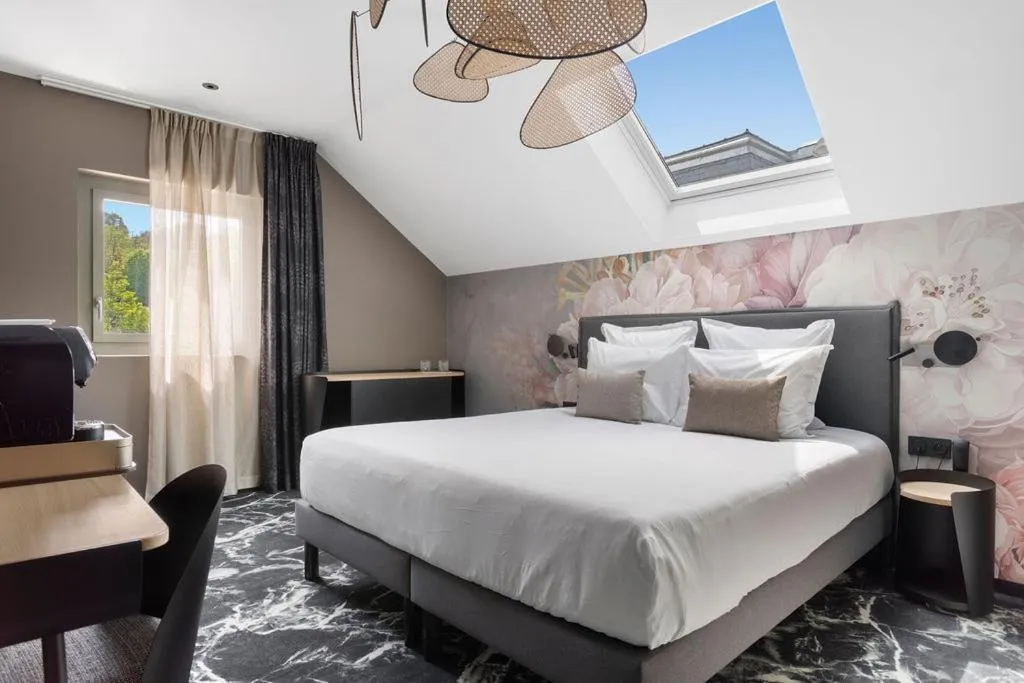 Bed in LE RITUEL HOTEL & SPA