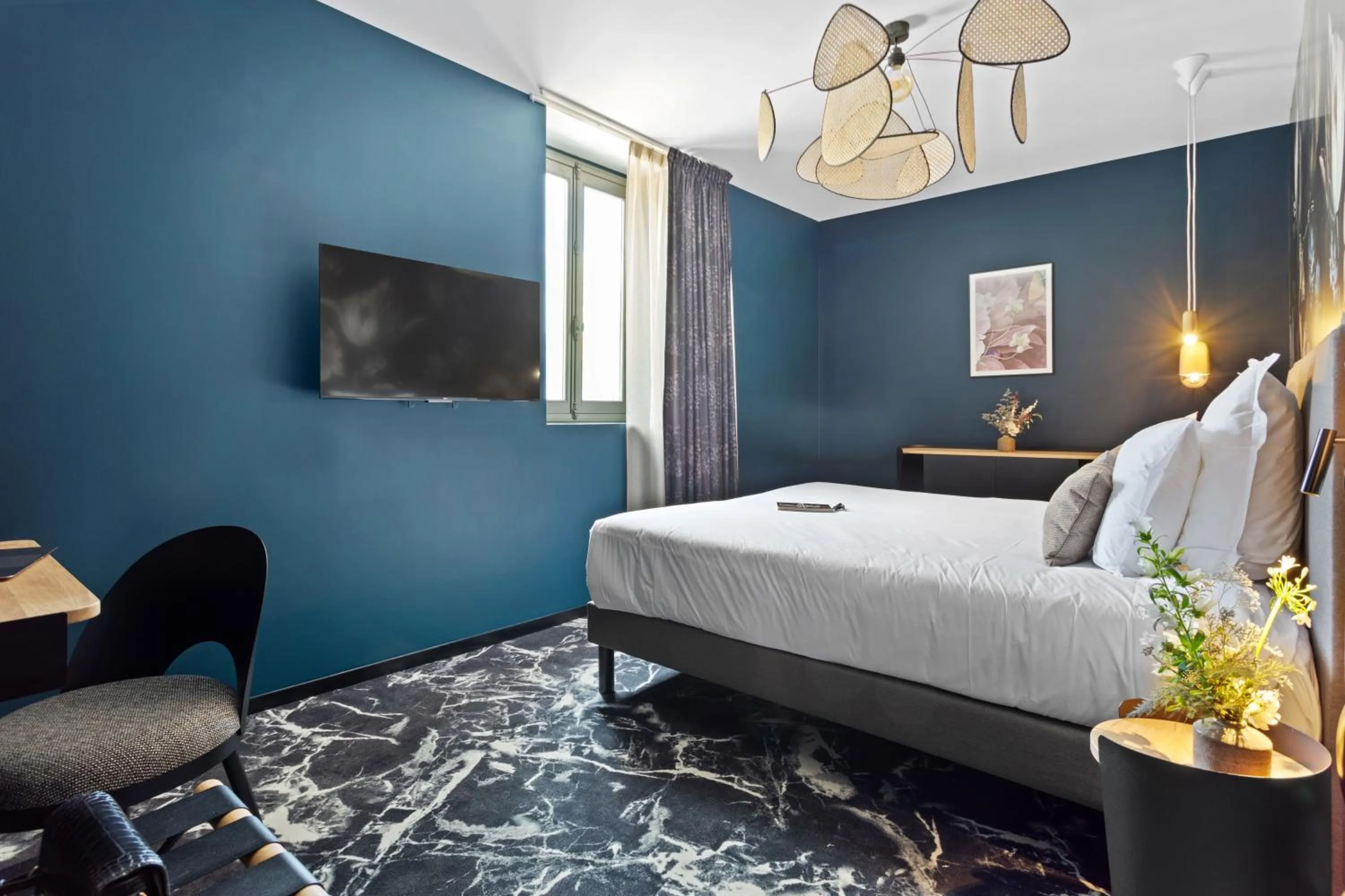 Bed in LE RITUEL HOTEL & SPA