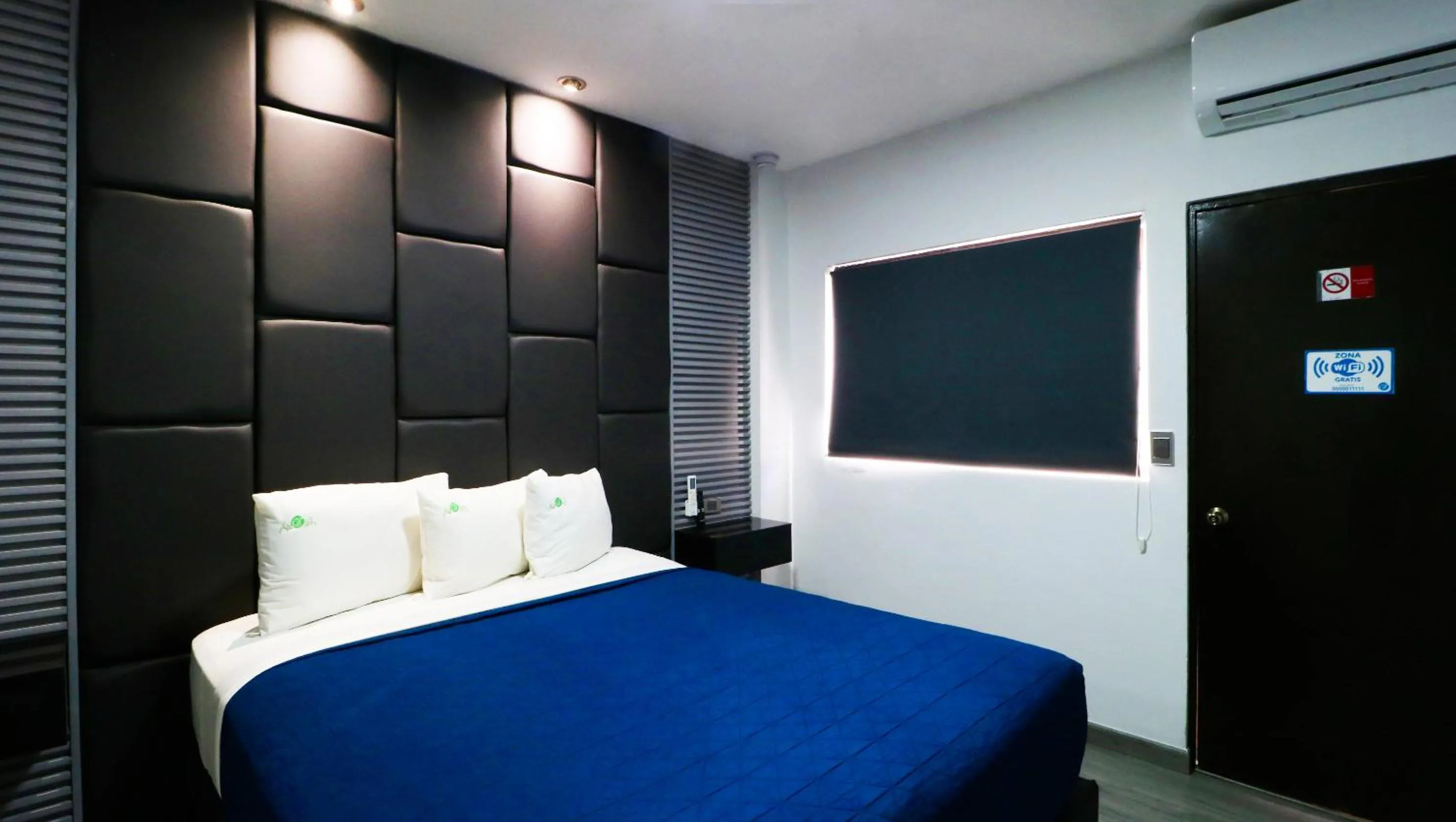 Bed in HOTEL BUGAMBILIAS