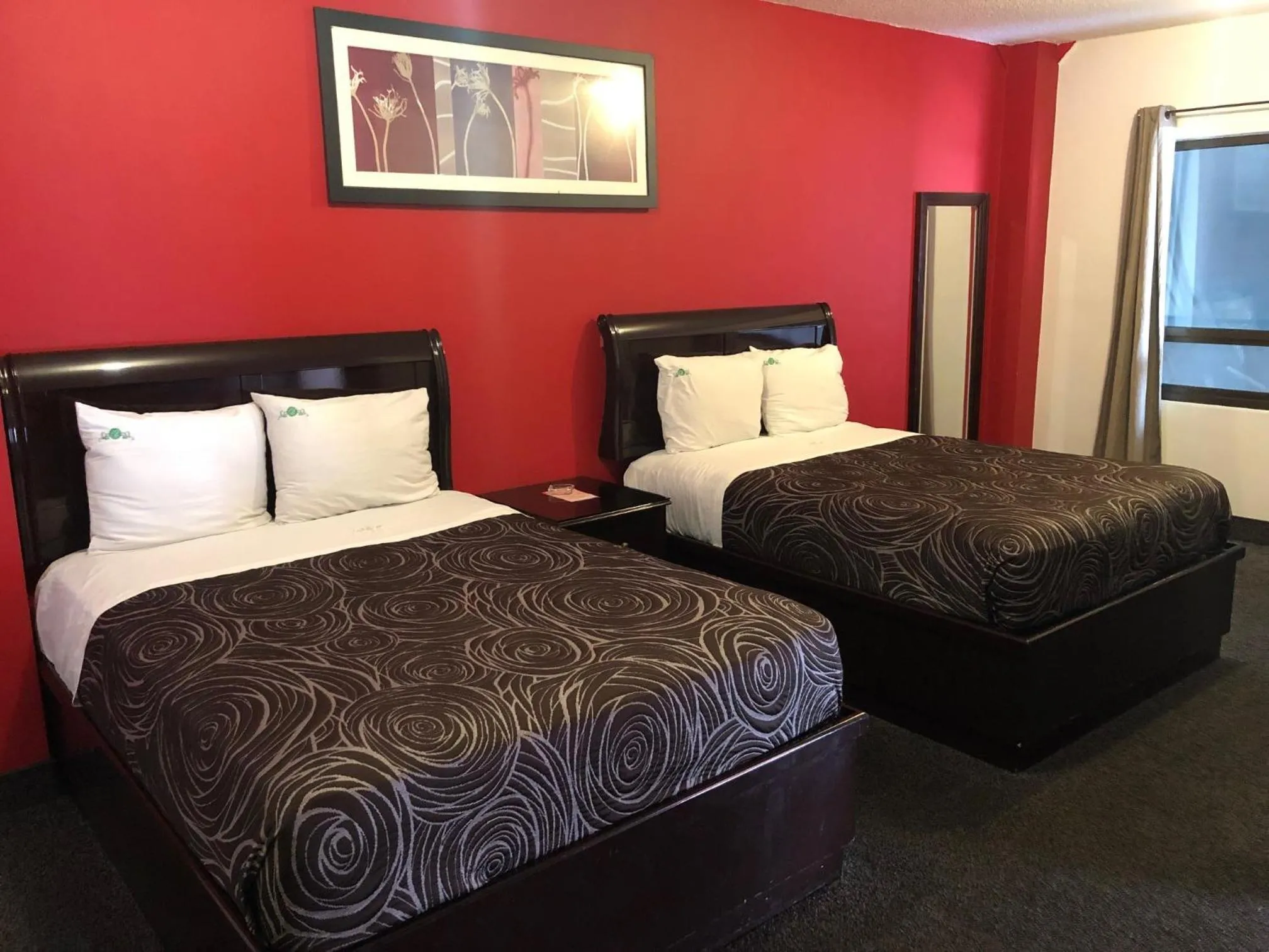 Bed in HOTEL BUGAMBILIAS