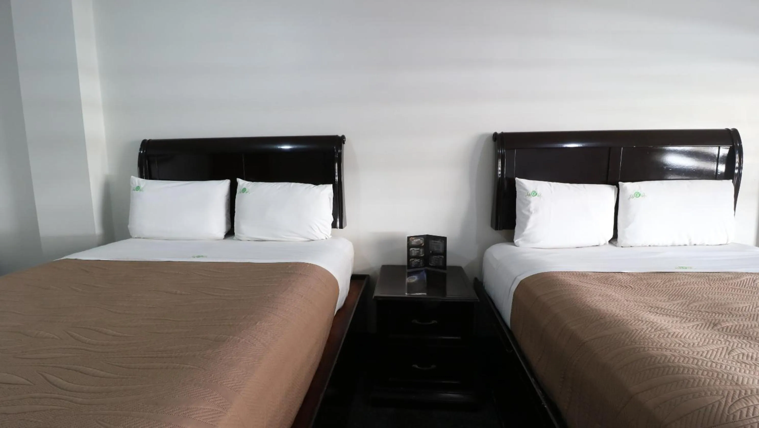Bed in HOTEL BUGAMBILIAS