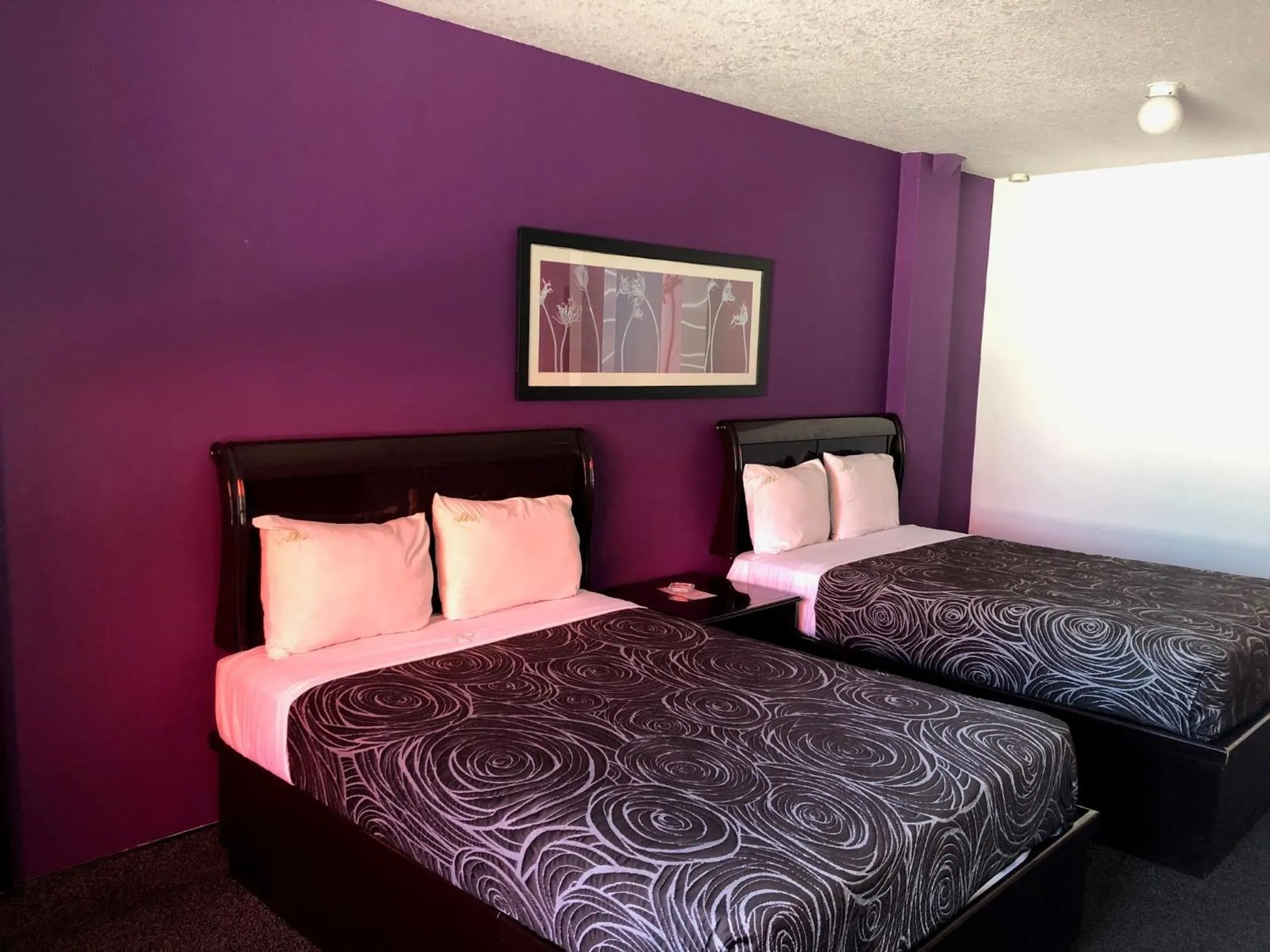 Bed in HOTEL BUGAMBILIAS