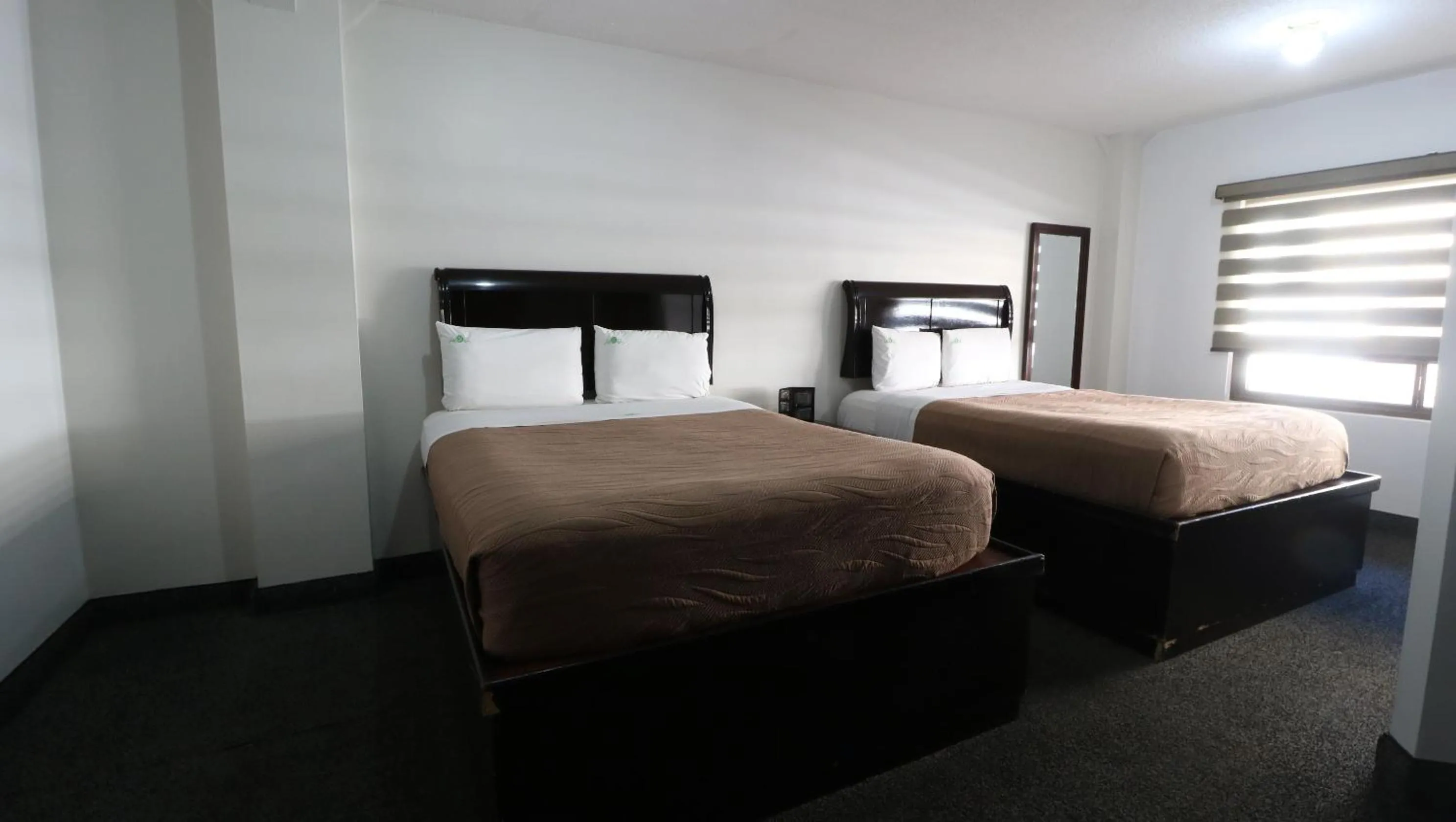 Bed in HOTEL BUGAMBILIAS