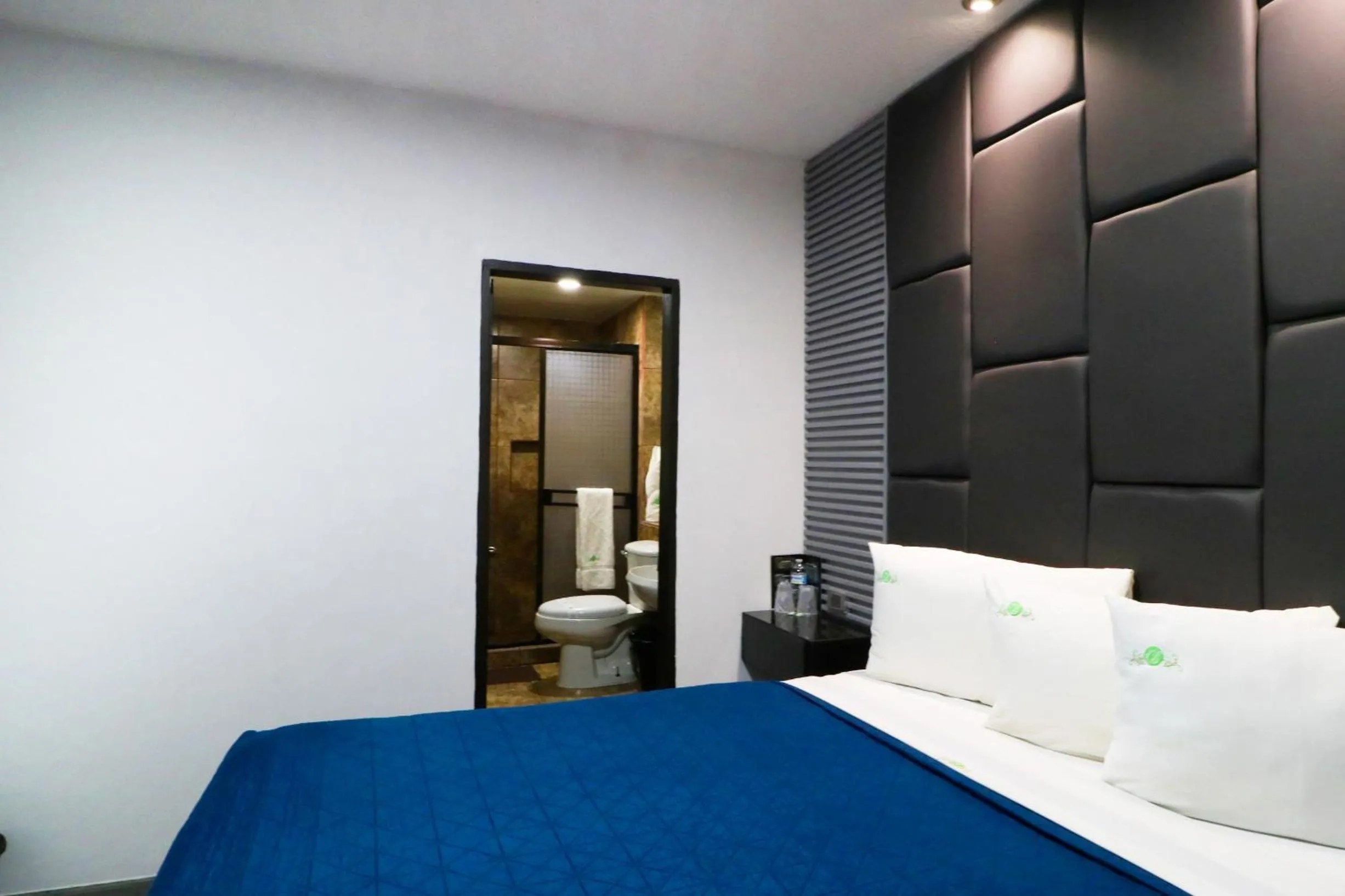 Bed in HOTEL BUGAMBILIAS