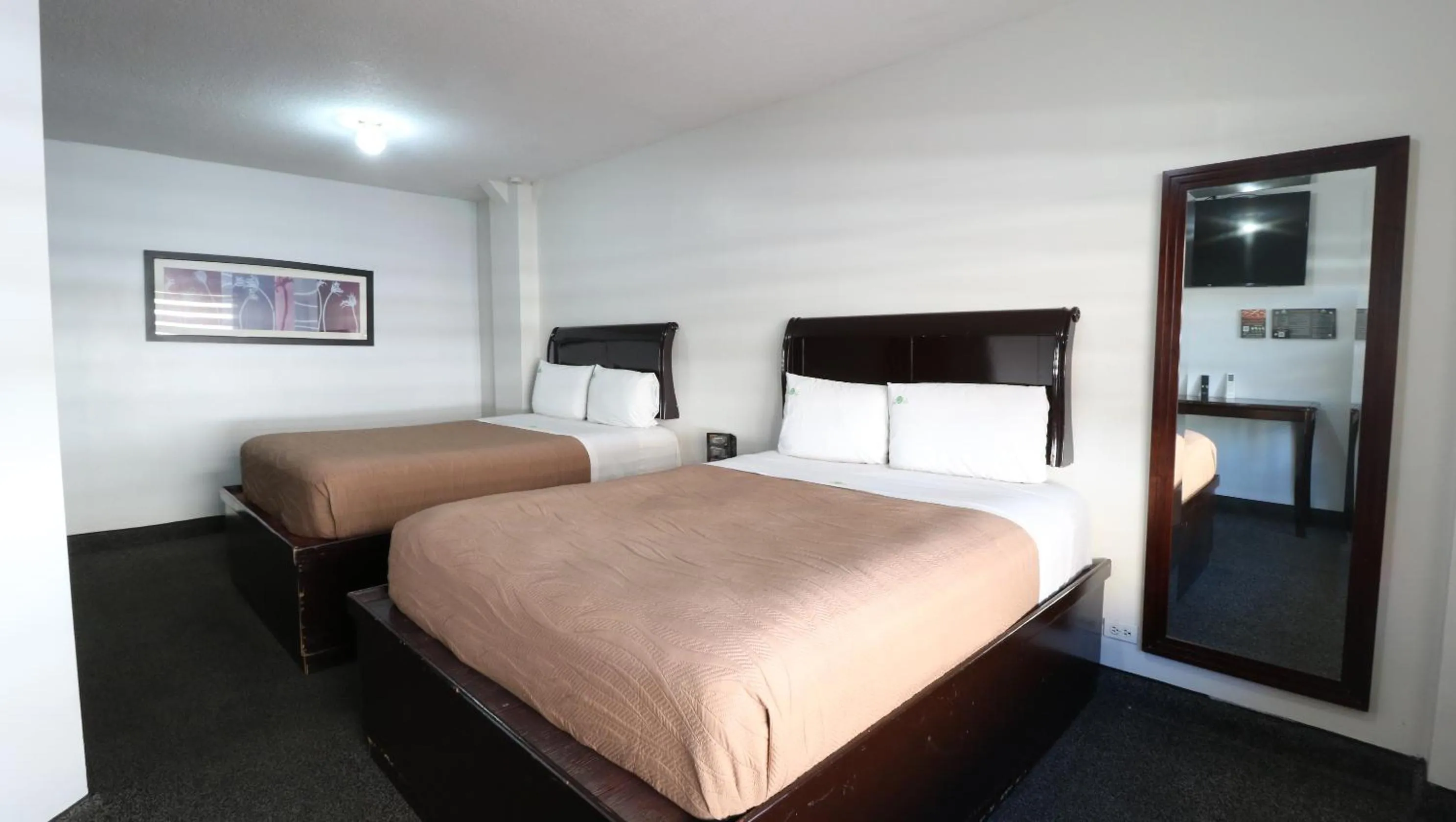 Bed in HOTEL BUGAMBILIAS