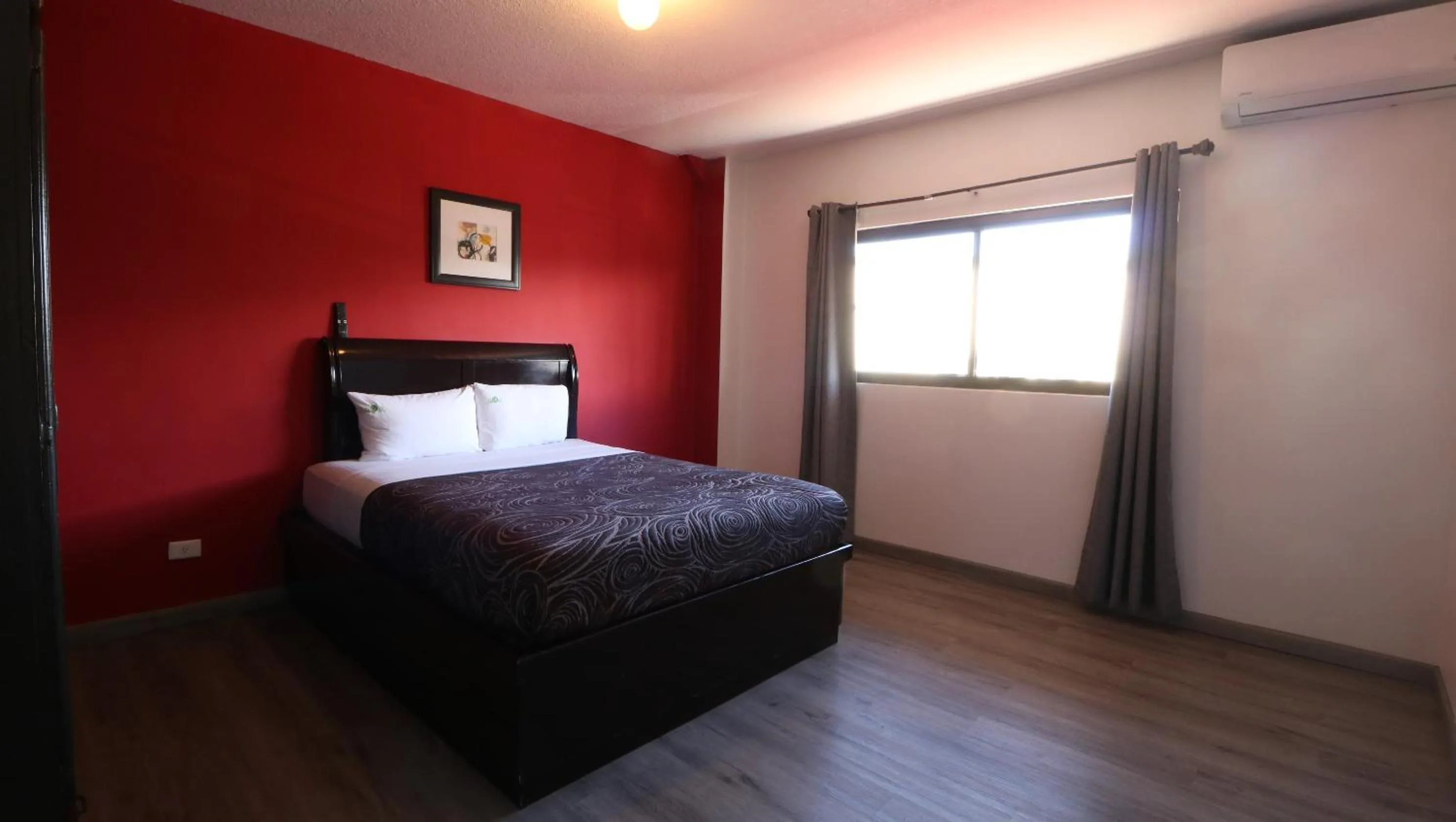 Bed in HOTEL BUGAMBILIAS