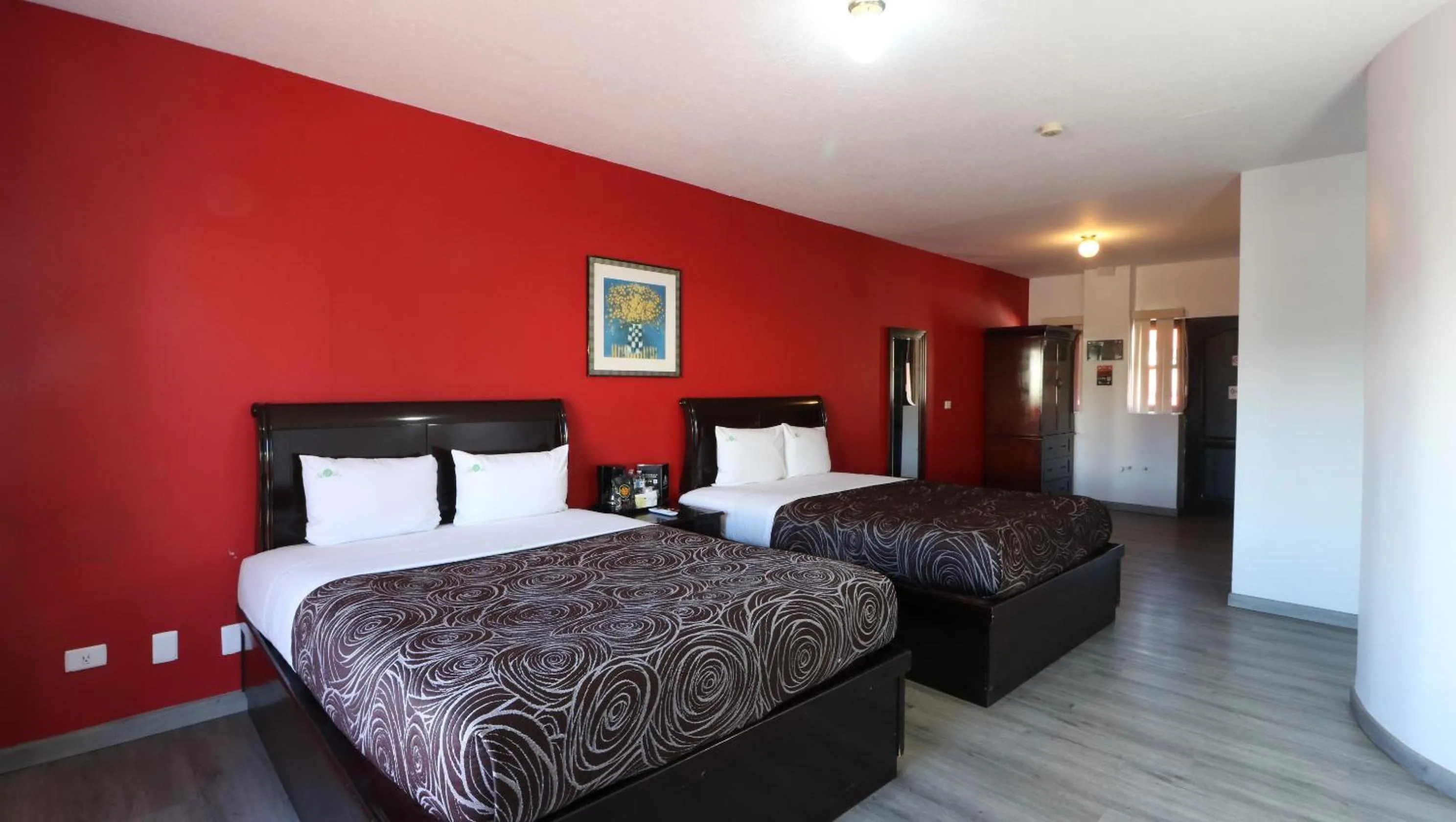 Bed in HOTEL BUGAMBILIAS