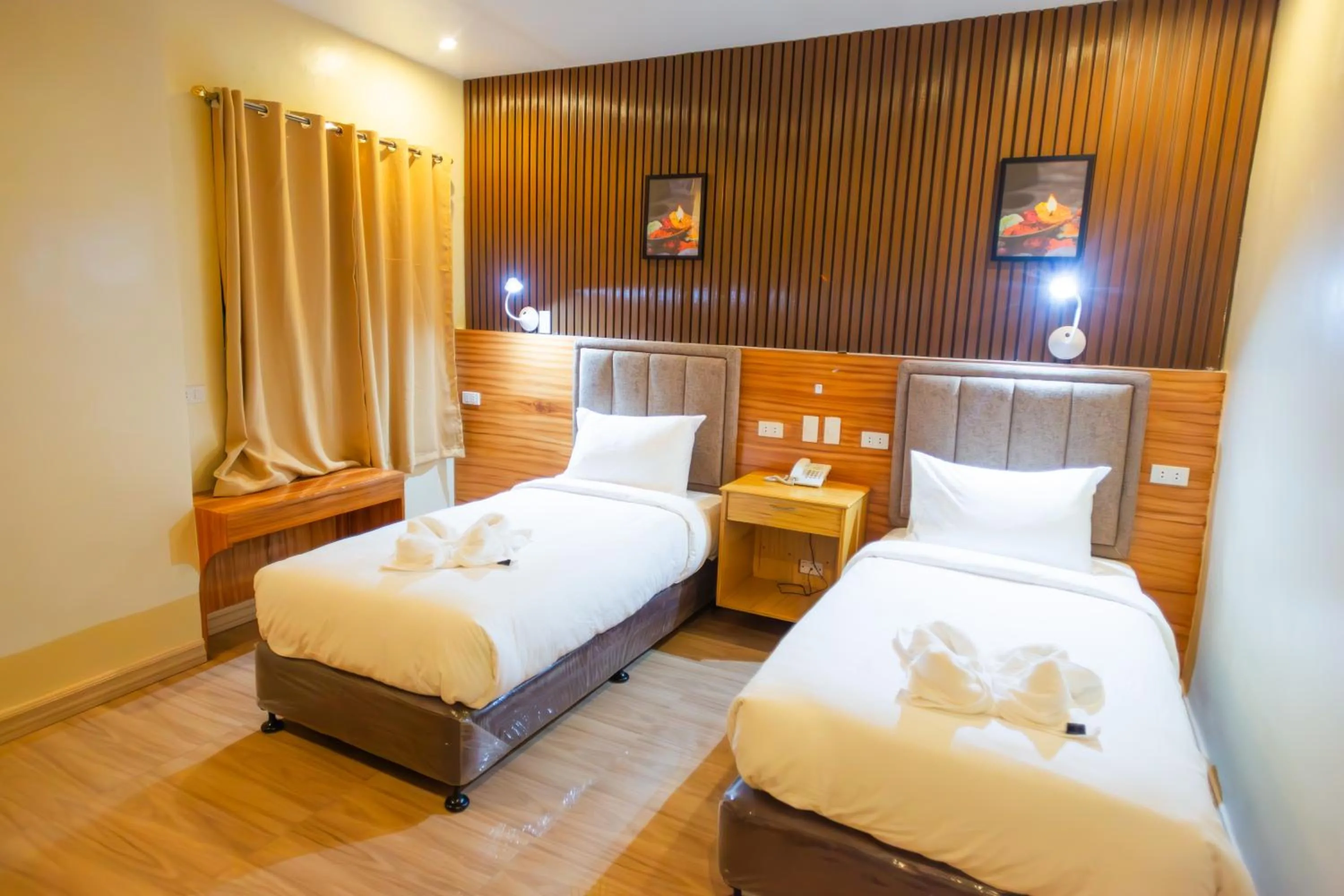 Bed in Raim Hotel