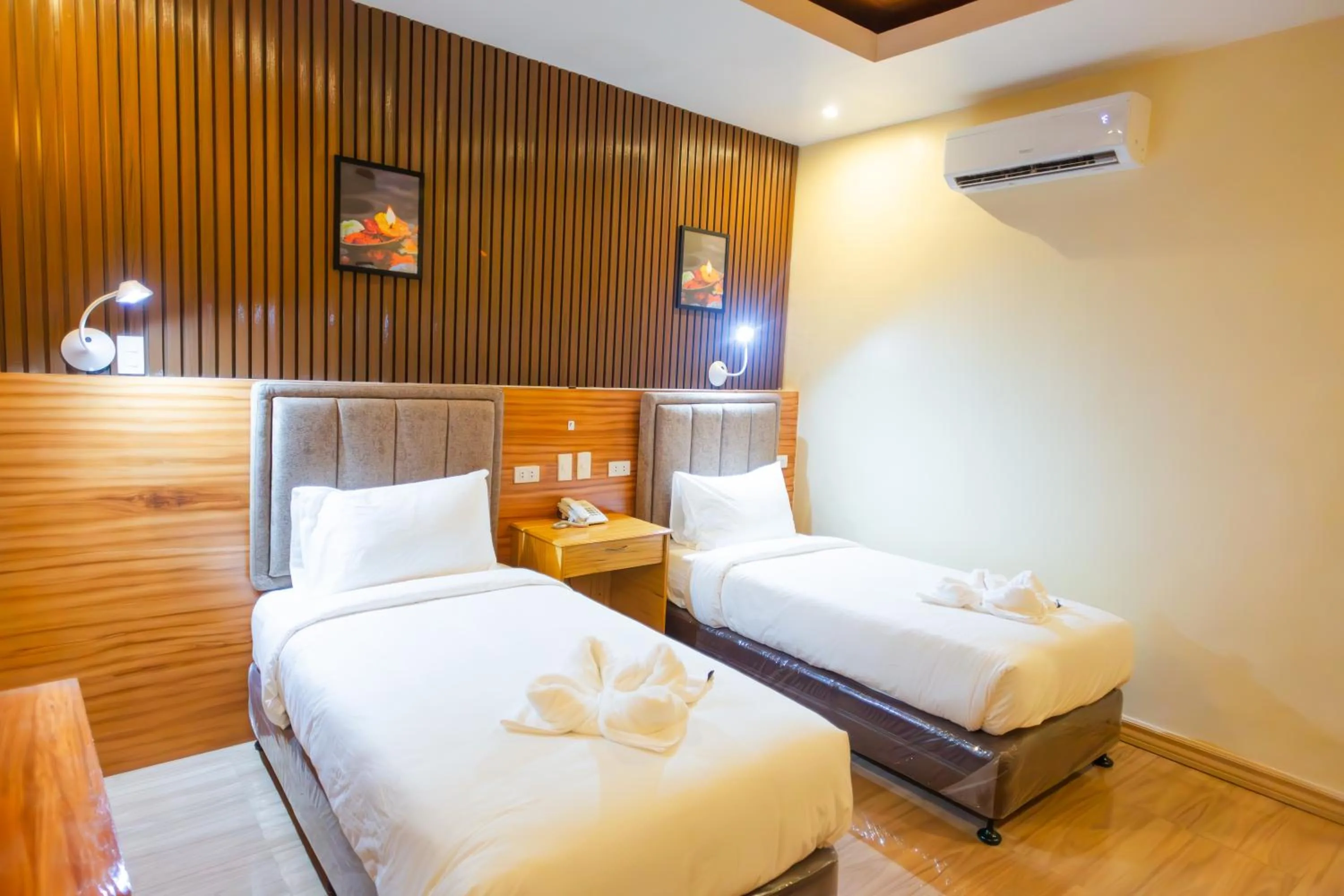 Bed in Raim Hotel