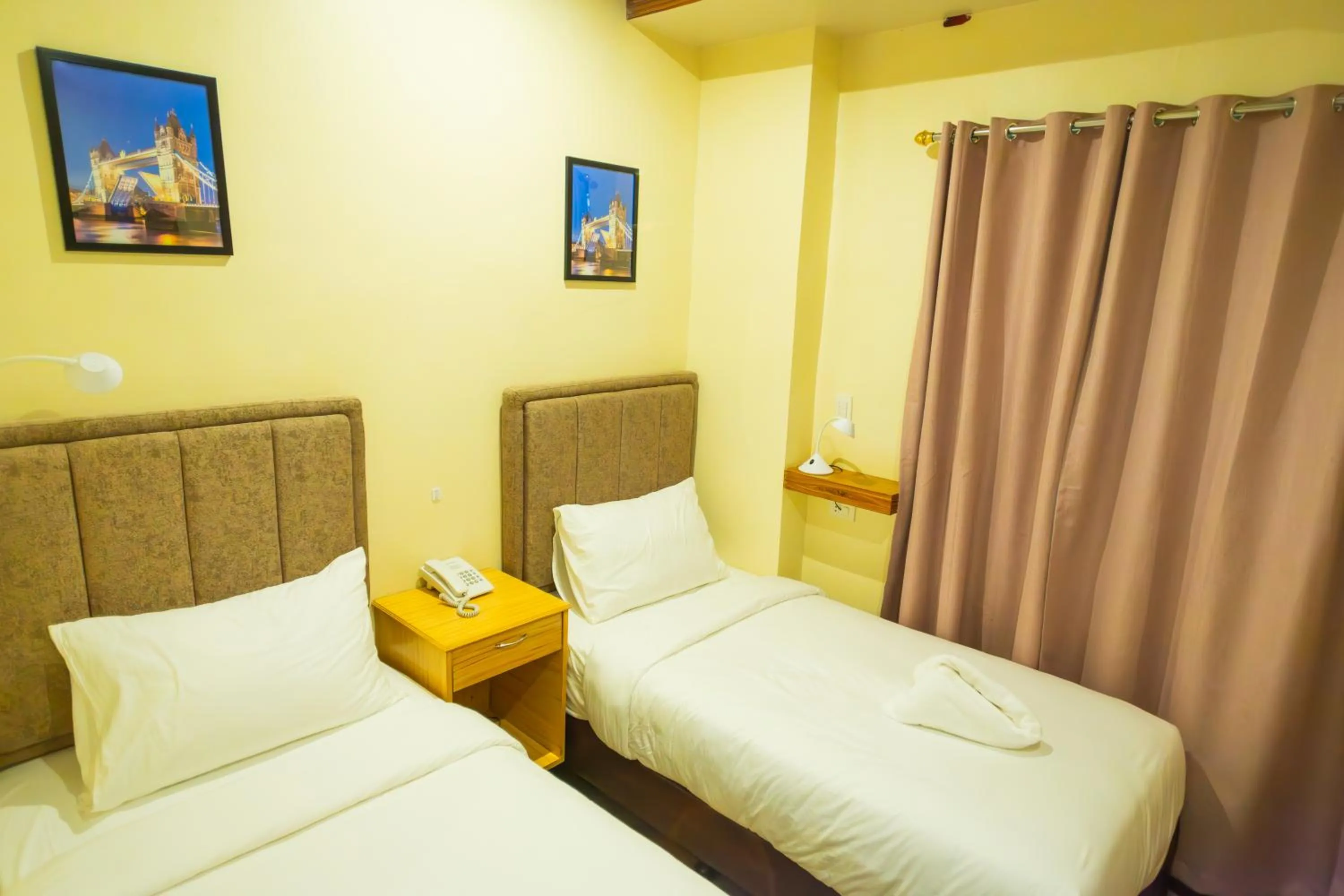 Bed in Raim Hotel