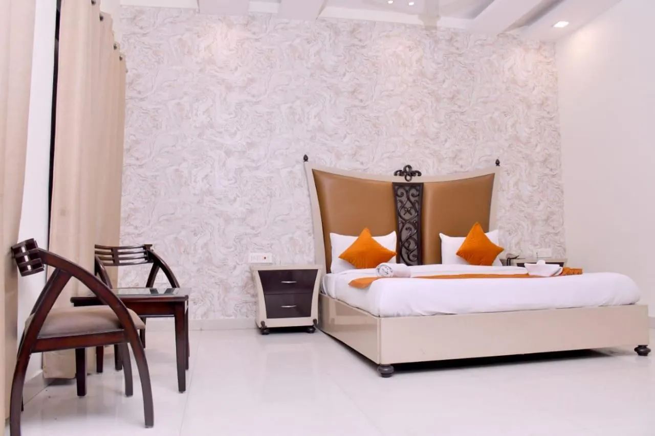 Bed in Nirmal Hotel And Resort