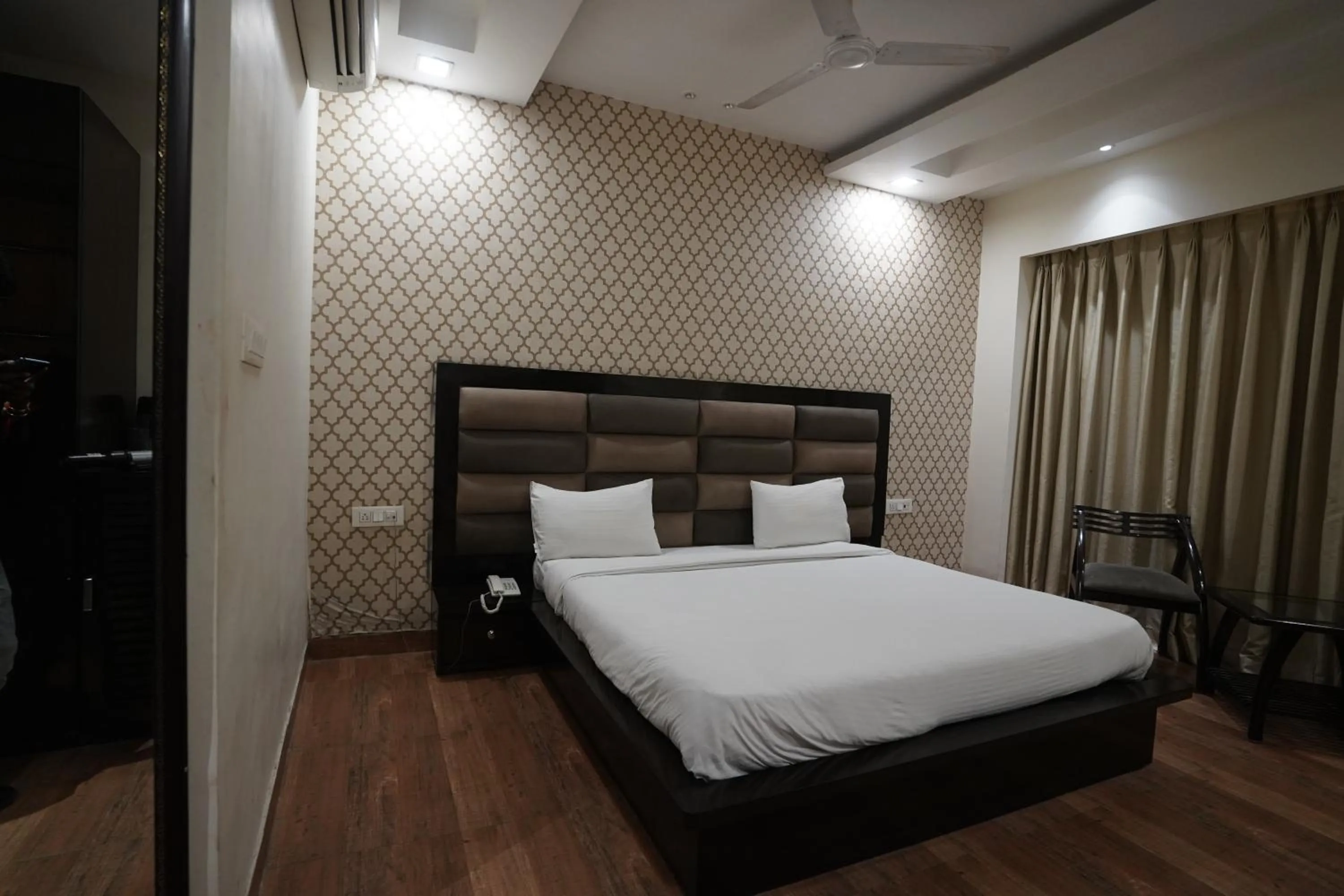 Bed in Nirmal Hotel And Resort