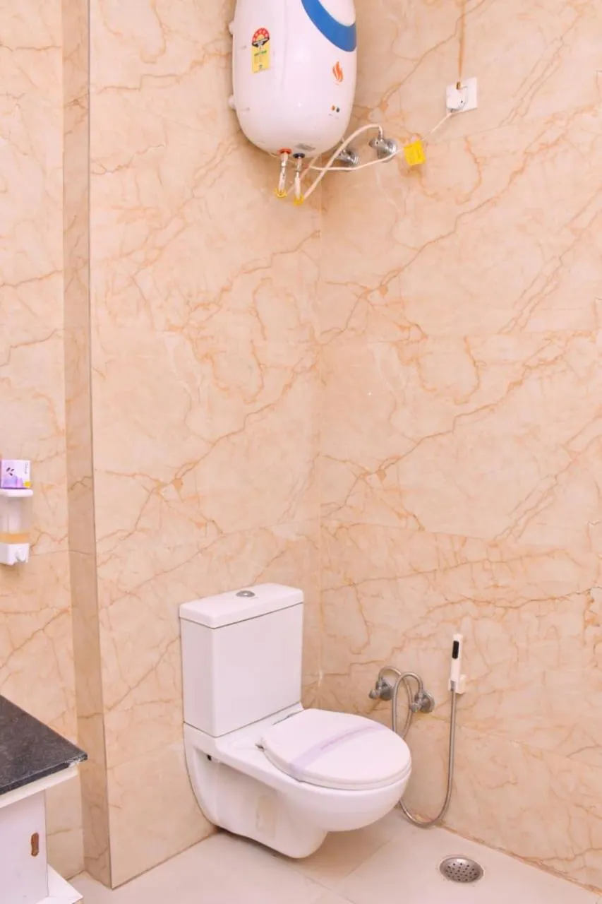 Shower in Nirmal Hotel And Resort