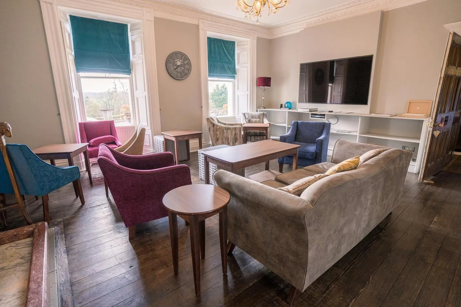 Communal lounge/ TV room in Court Colman Manor