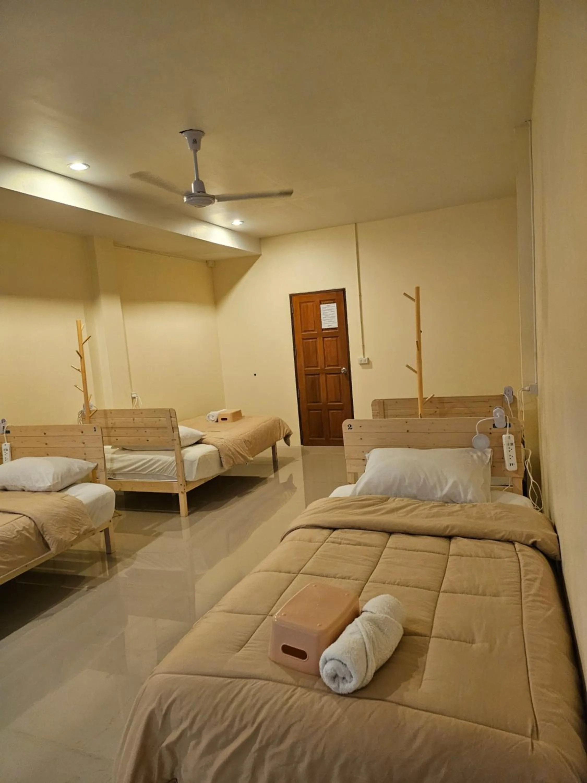 Bed in SKYPEARL Guesthouse & Café