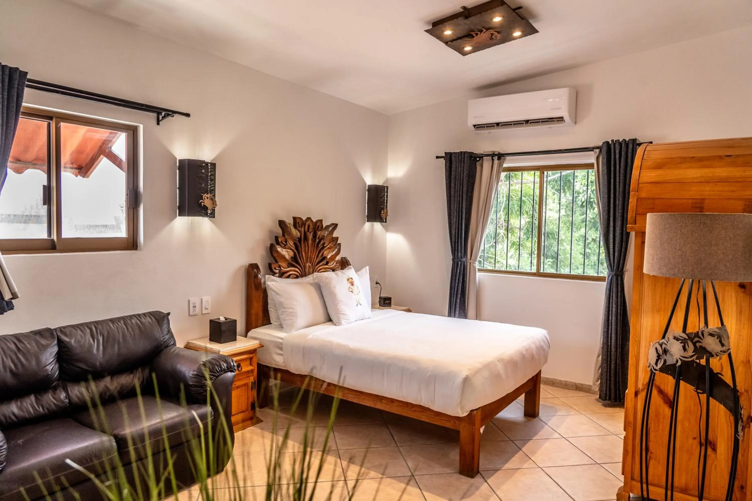 Bed in 5 Frogs Hotel Bucerias