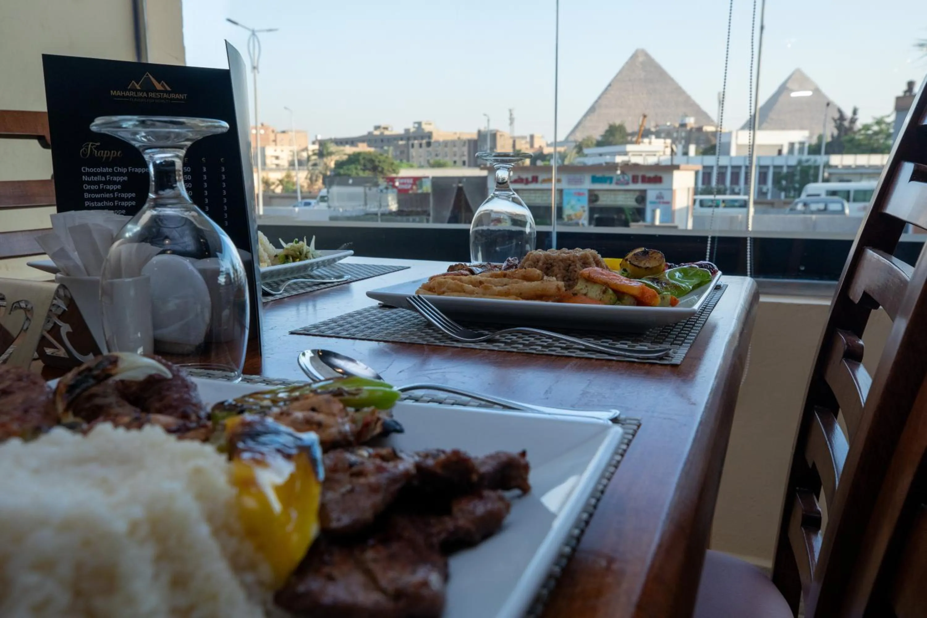 Restaurant/places to eat in The Muse Pyramids INN