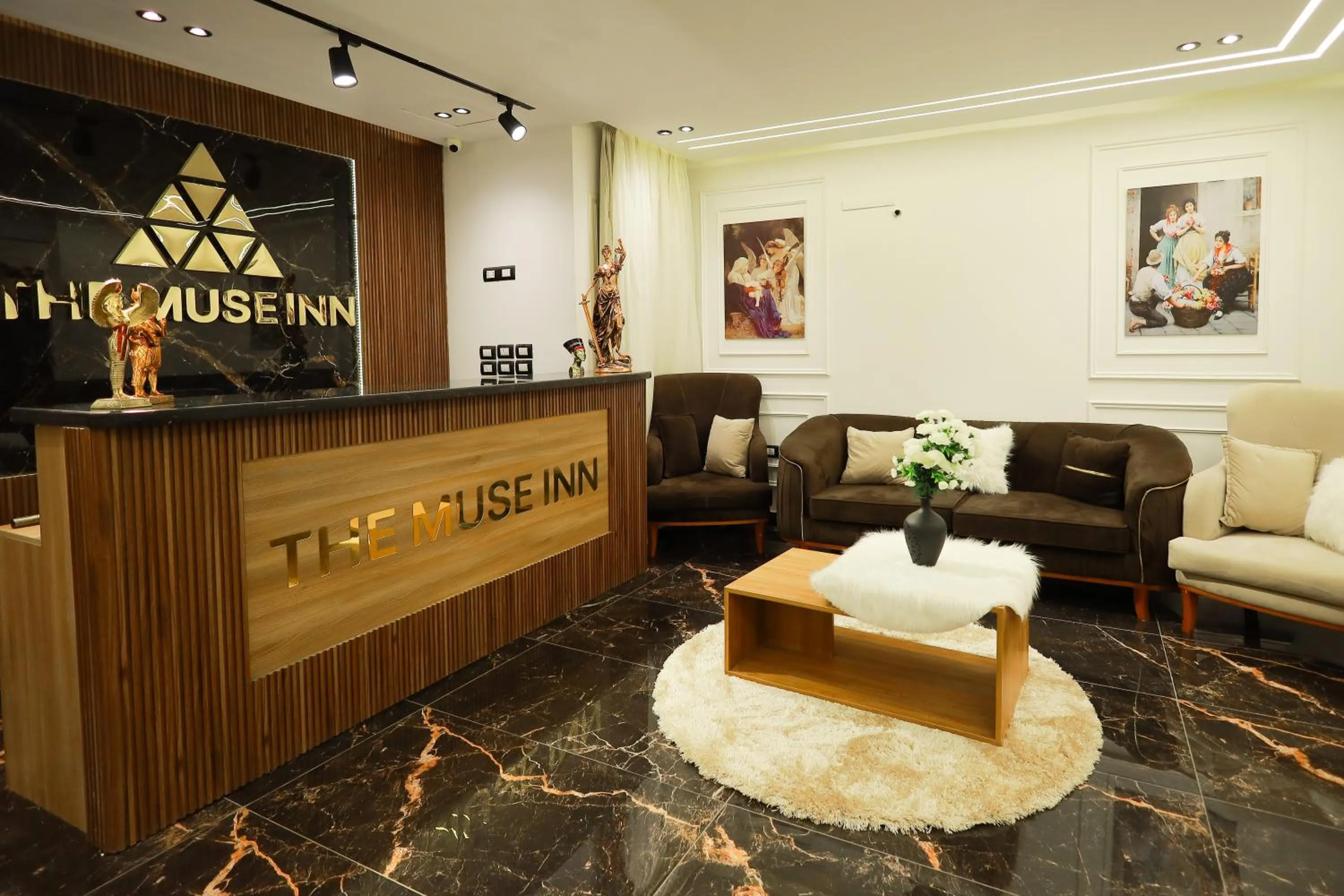 Property logo or sign in The Muse Pyramids INN