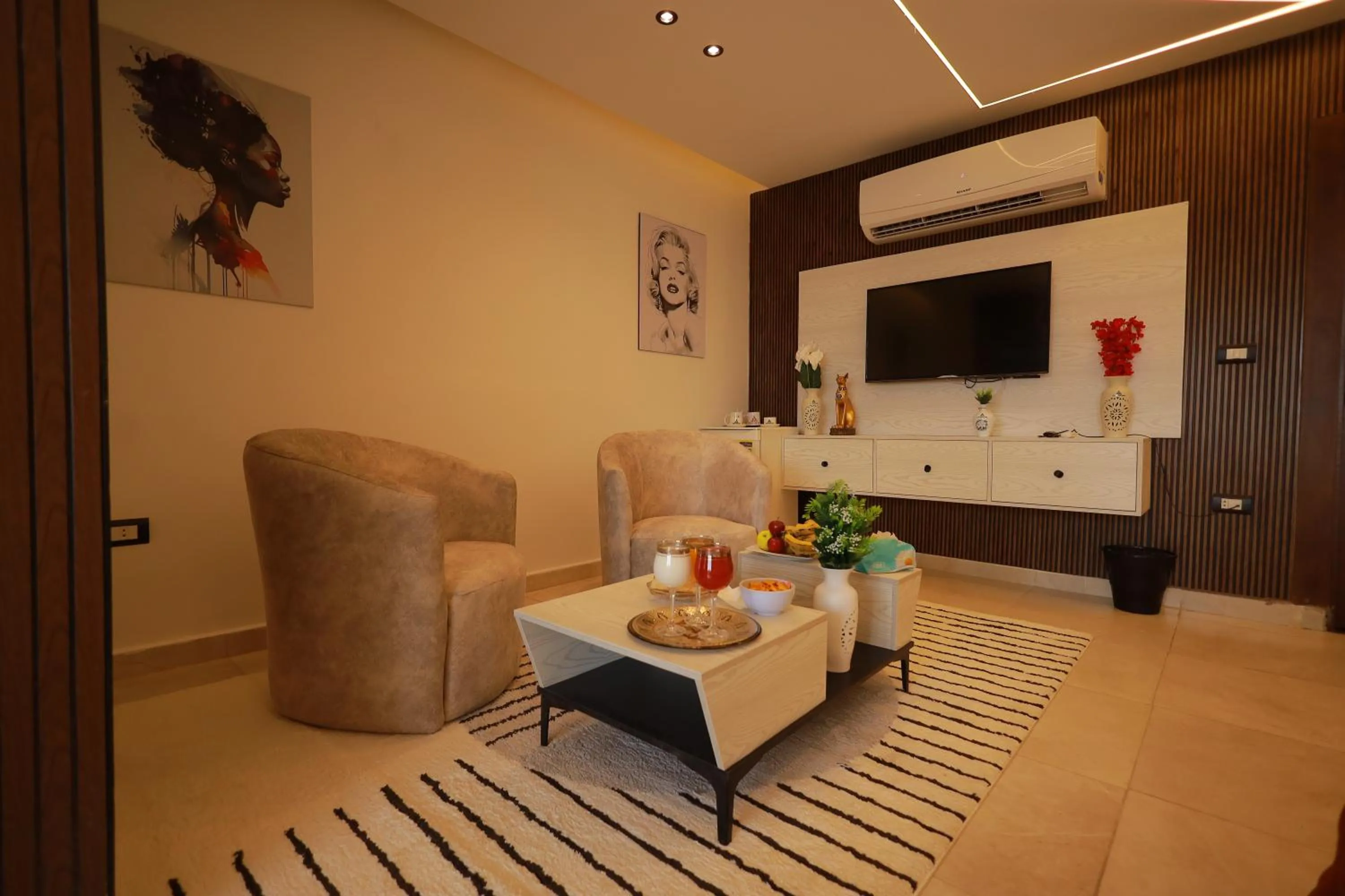 Living room in The Muse Pyramids INN