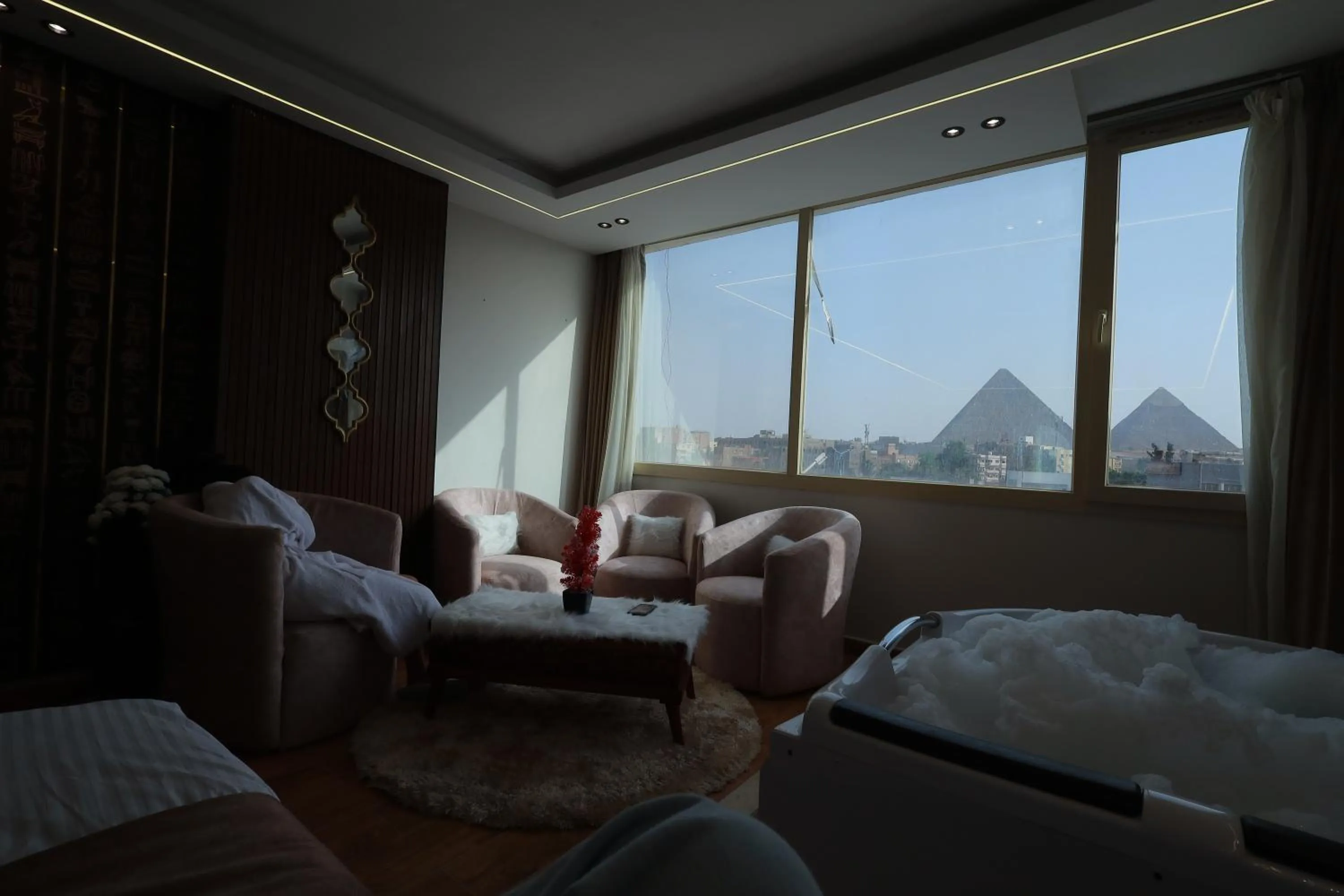 Seating area in The Muse Pyramids INN