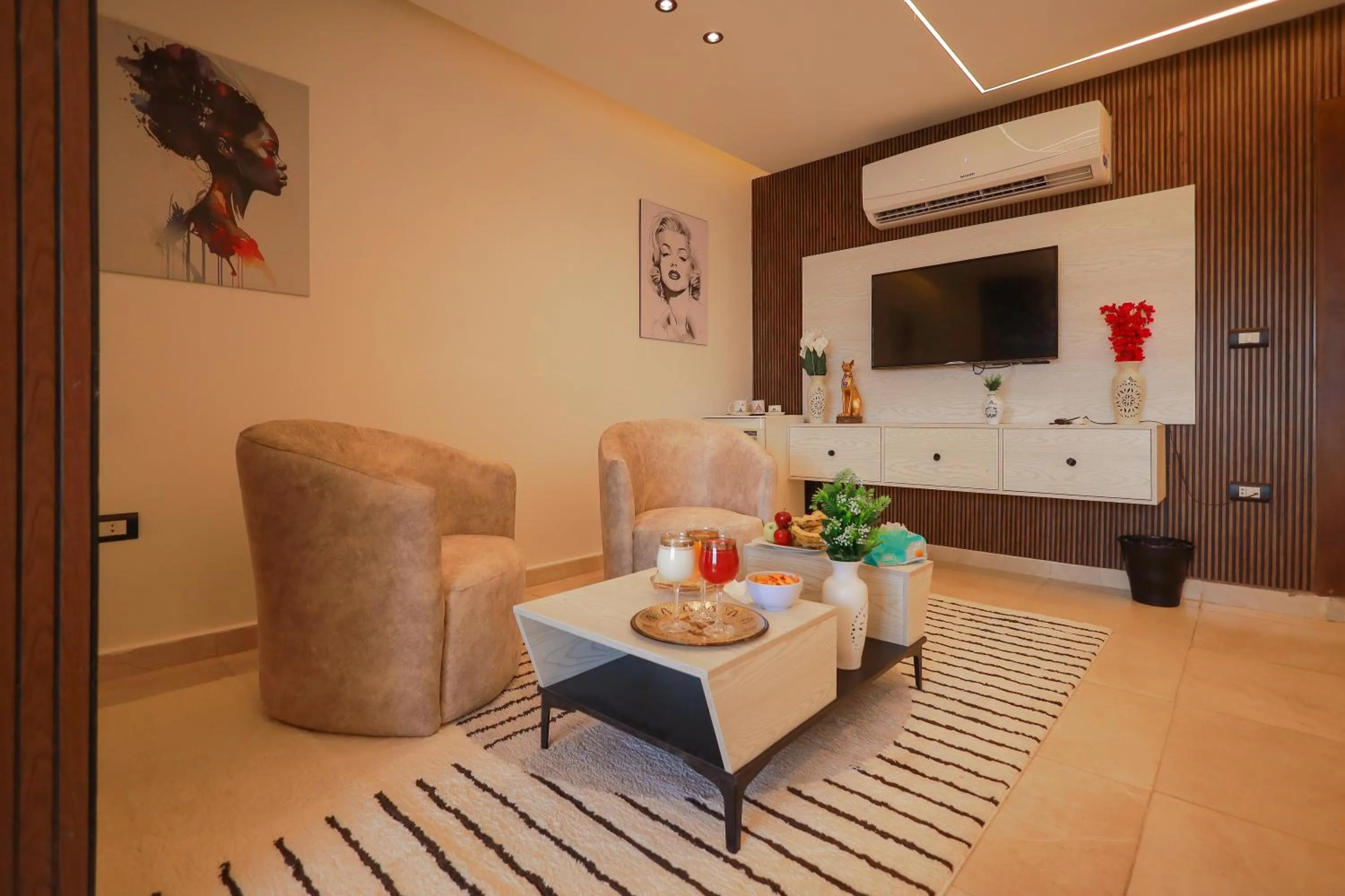 Seating area in The Muse Pyramids INN