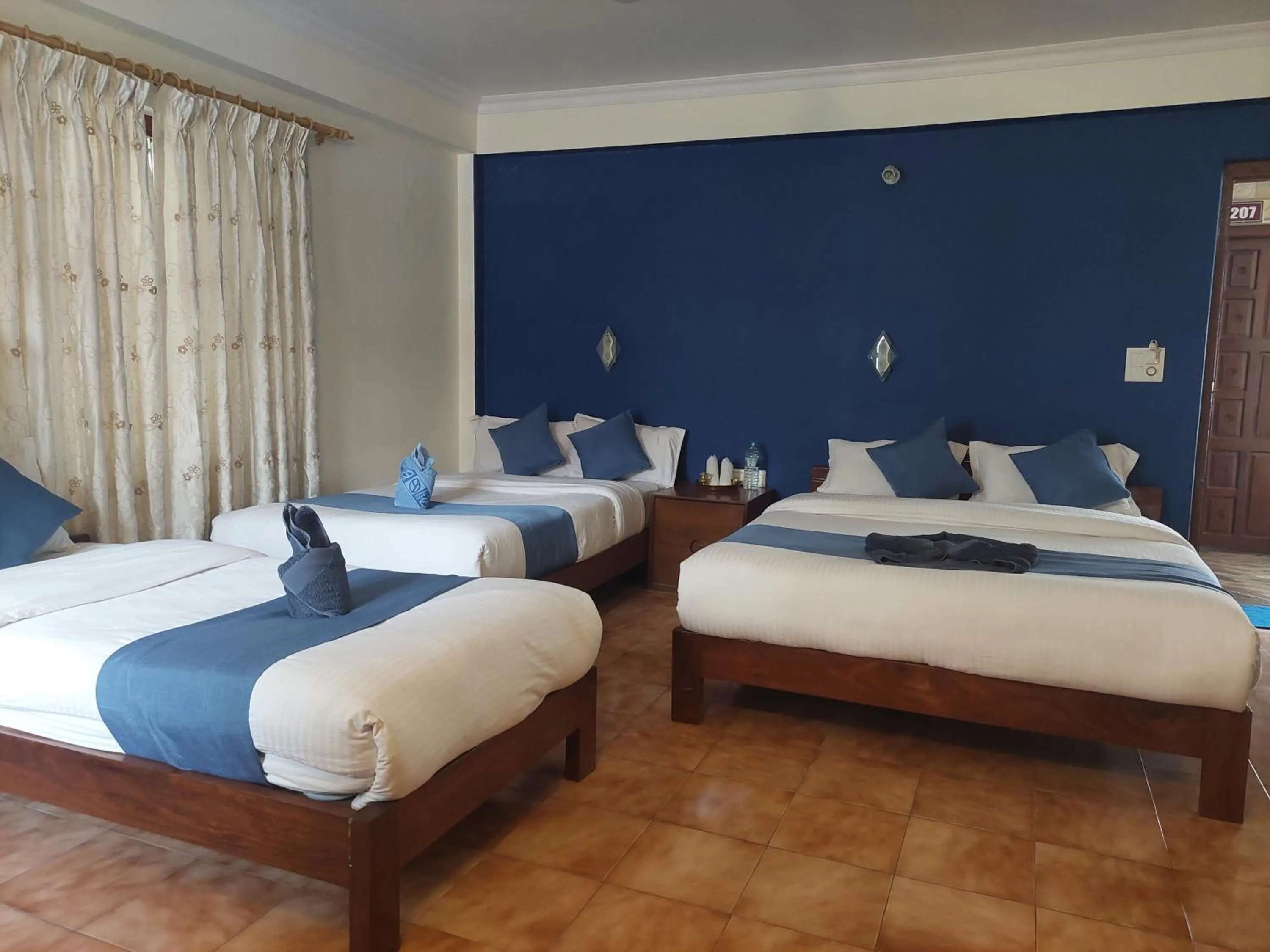 Bed in Blue Planet Lodge & Restaurant