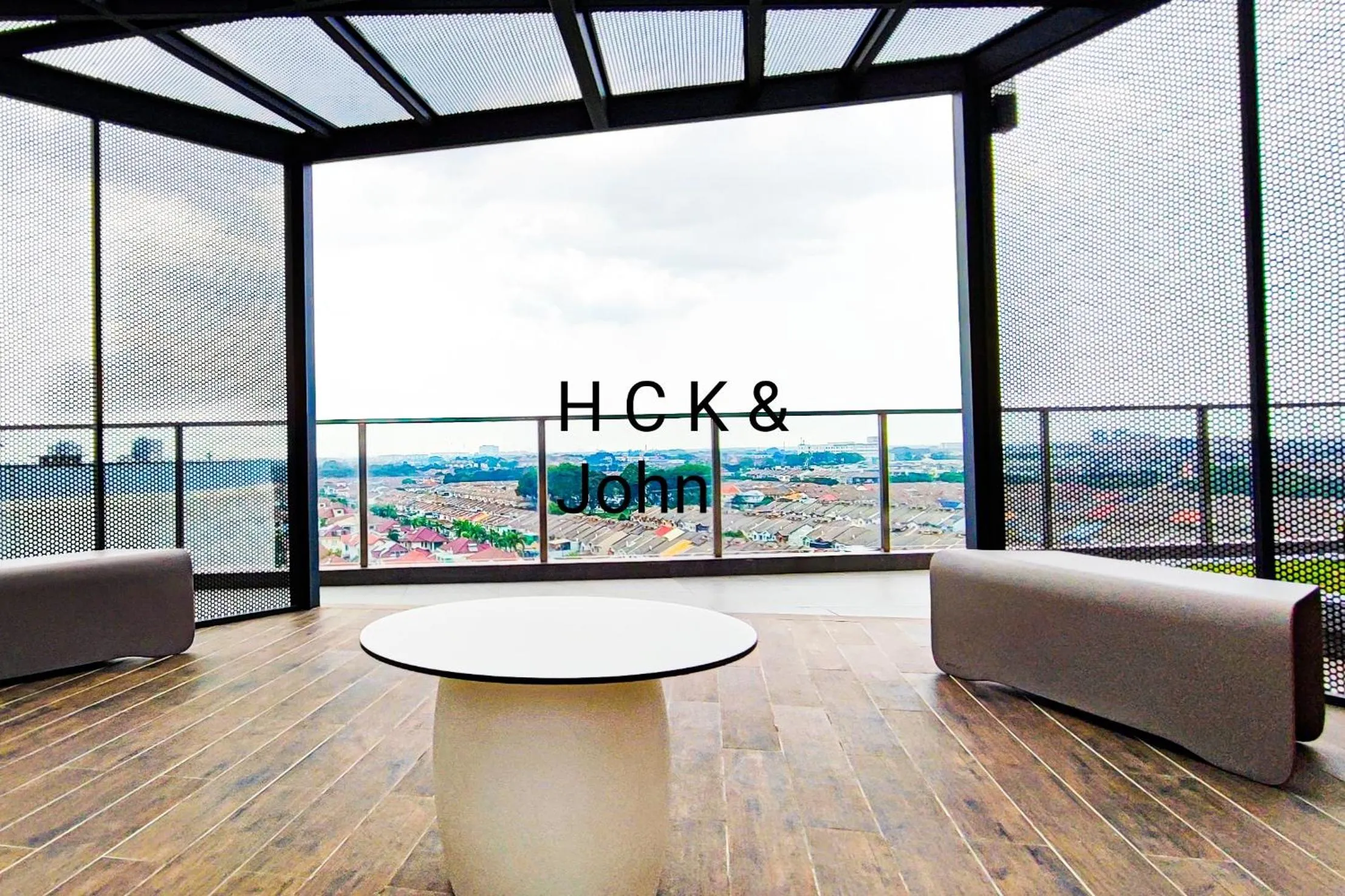 Seating area in Double Storey Pool at Trio Setia by HCK