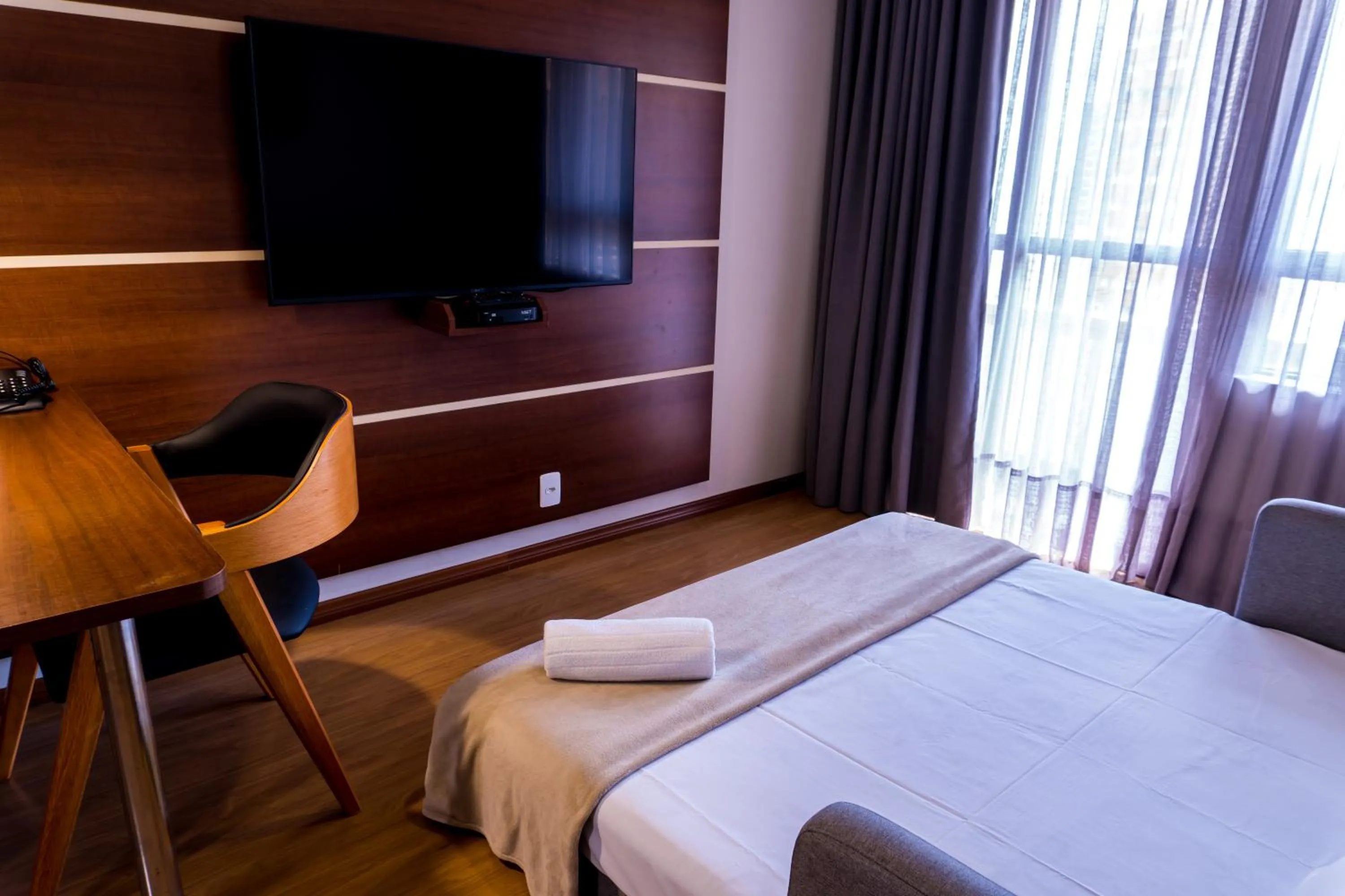 Living room, Bed in Mercure Curitiba Golden