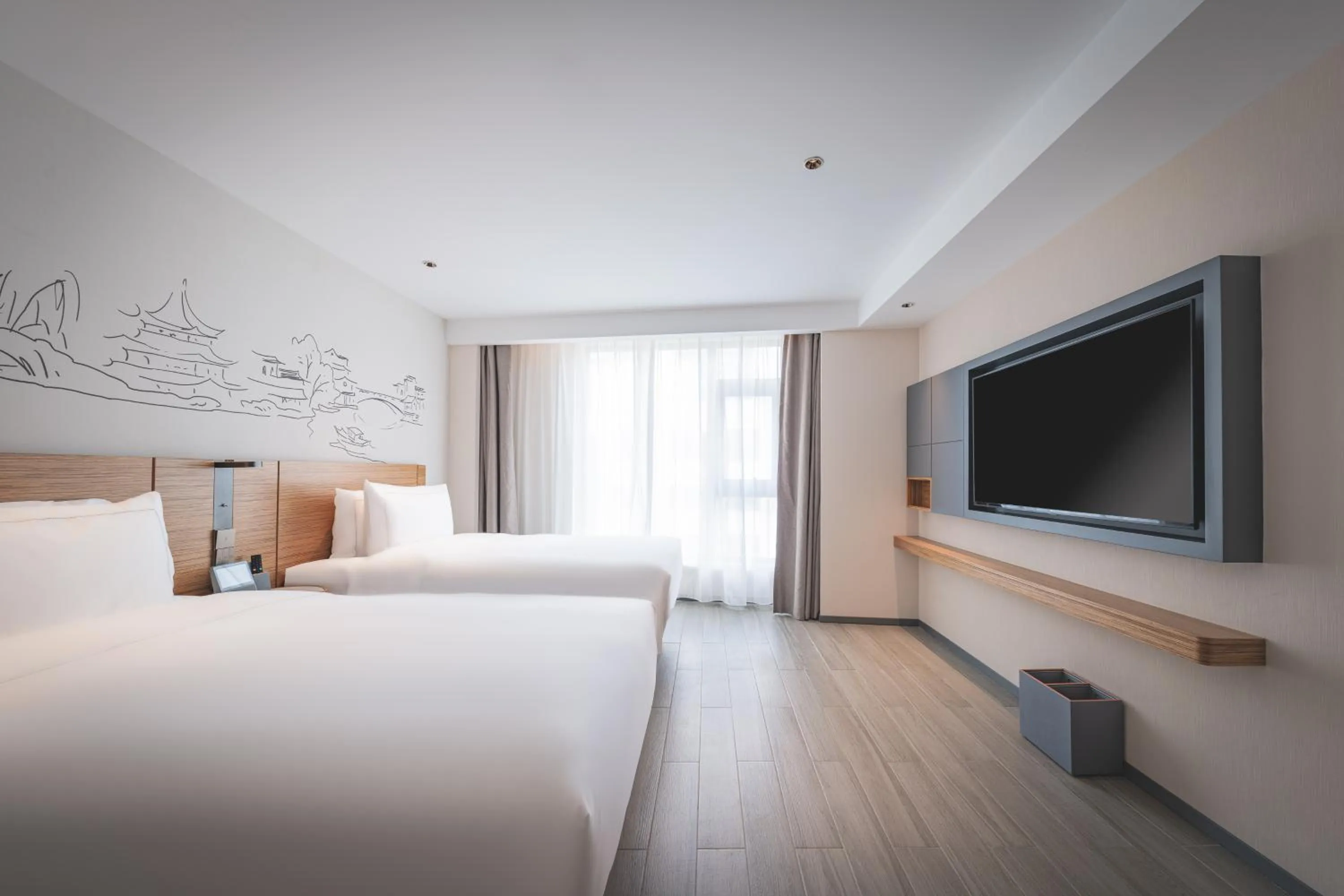 Communal lounge/ TV room in UrCove by HYATT Nanjing Downtown