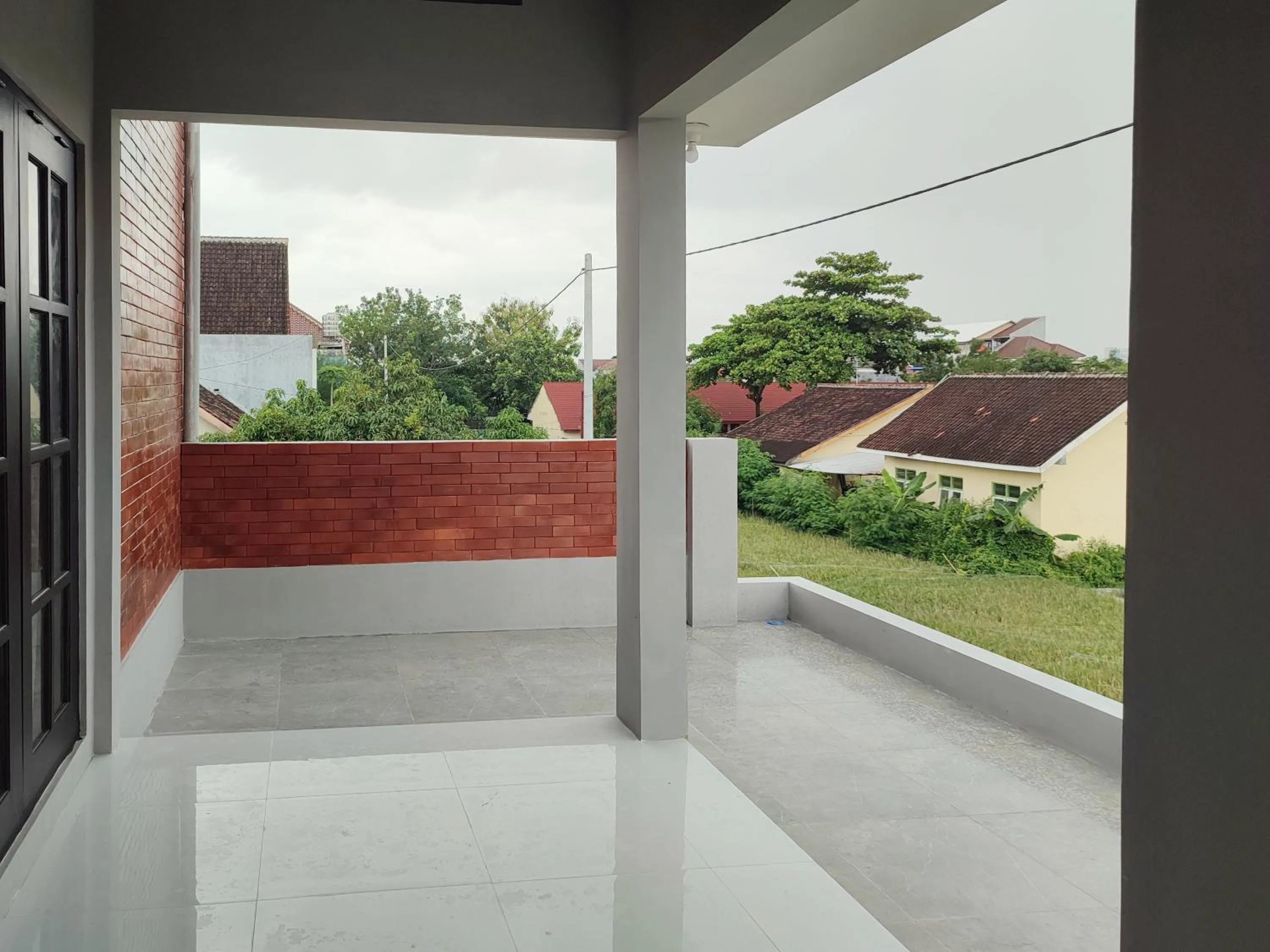Balcony/Terrace in RedDoorz near Graha Saba Buana 2