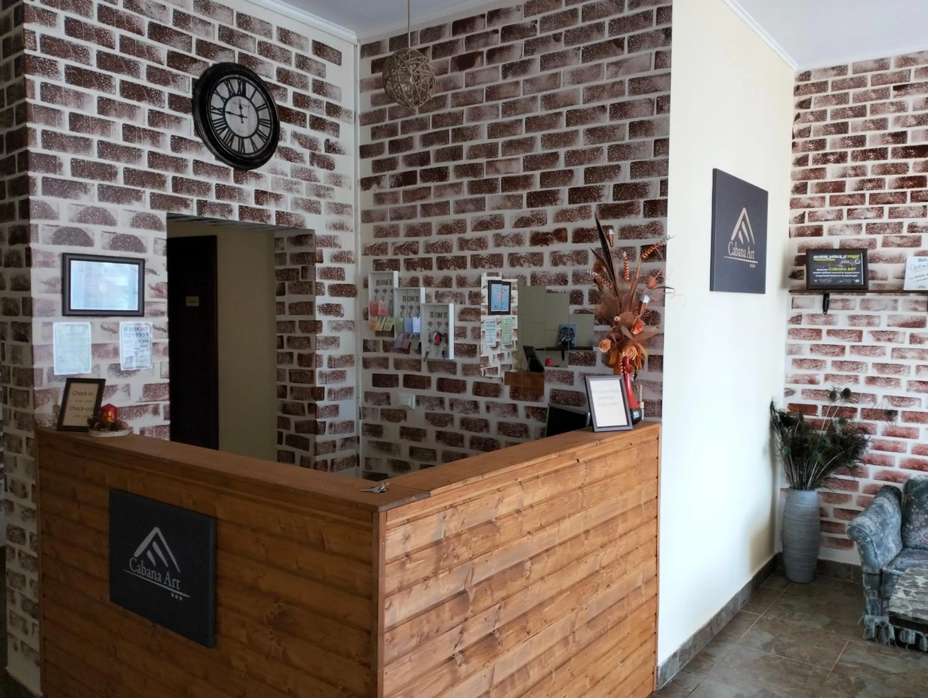 Lobby or reception in Pensiunea Cabana Art