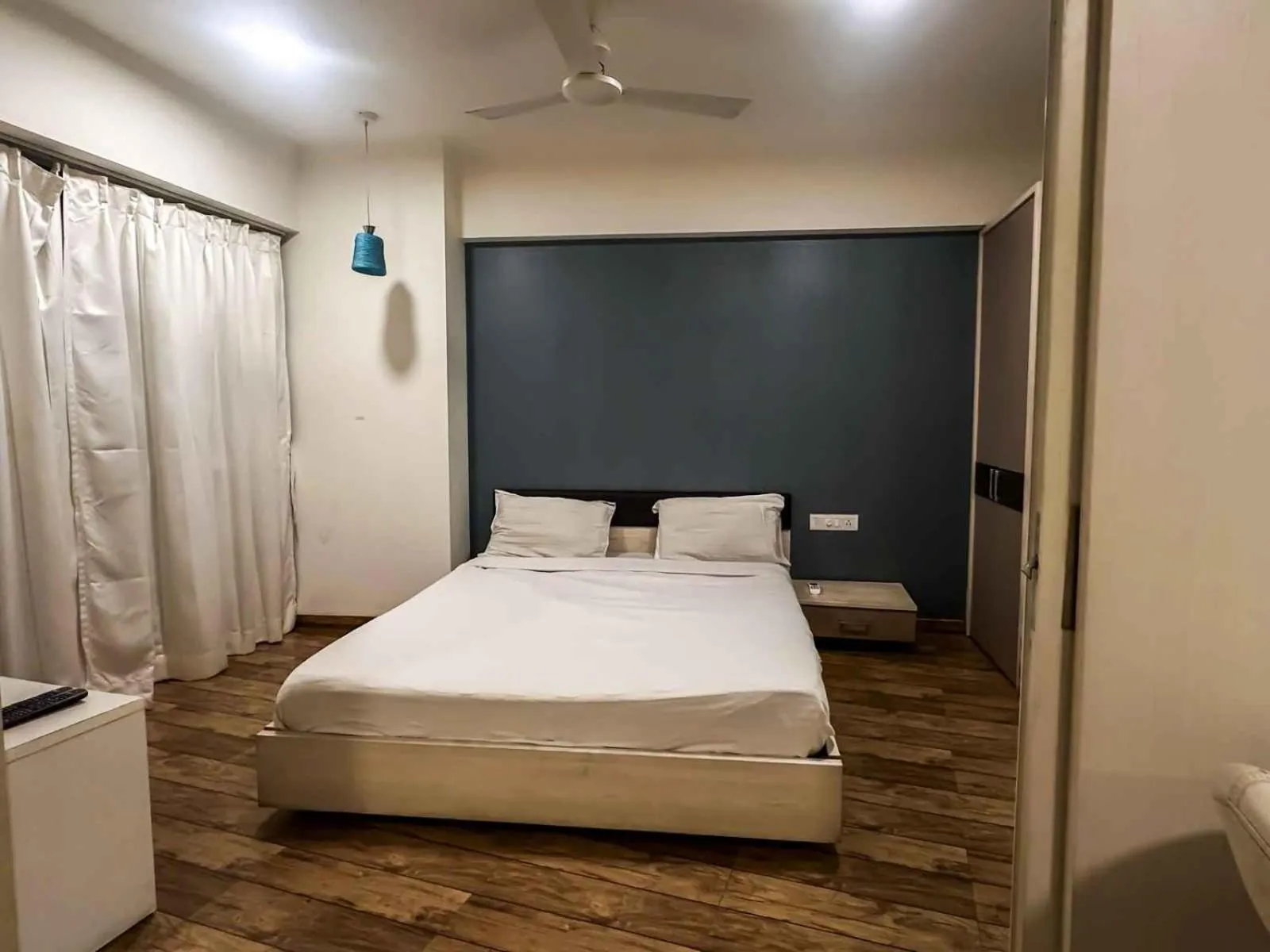 Photo of the whole room, Bed in Ambition studio apartment at rajhans belliza