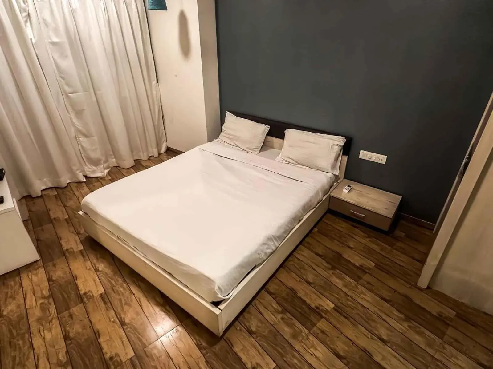 Bed in Ambition studio apartment at rajhans belliza Bed in Ambition studio apartment at rajhans belliza