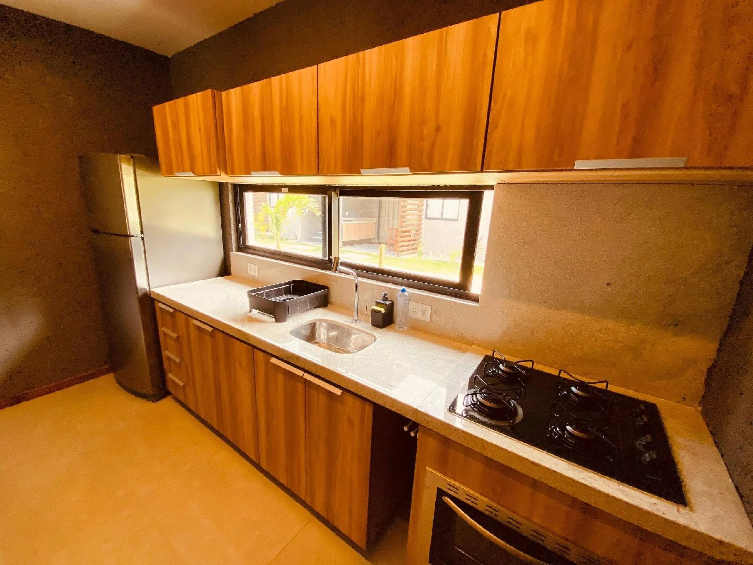 Kitchen or kitchenette in Villas Manatee Milagres por Quarto à Vista