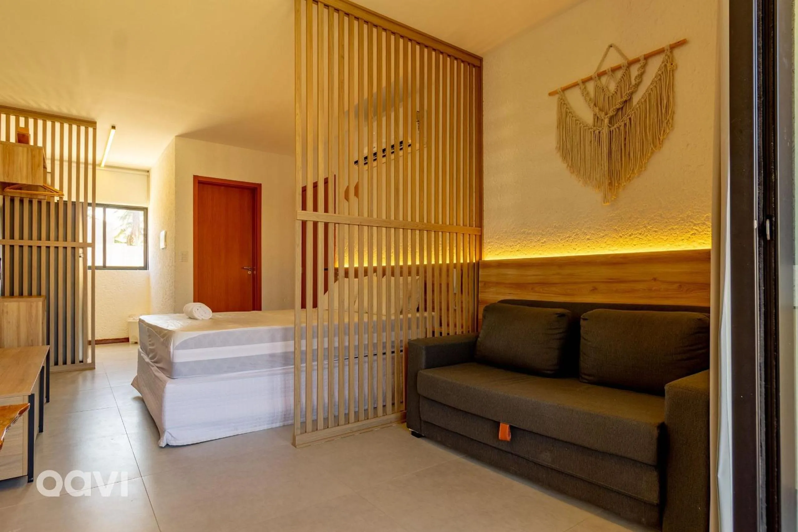 Living room, Bed in Villas Manatee Milagres por Quarto à Vista