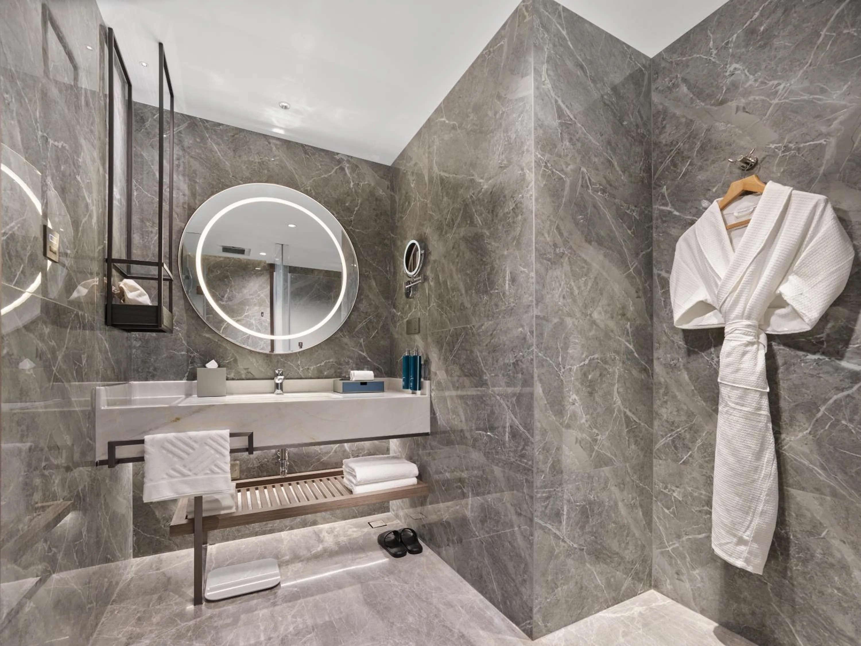 Bathroom in Doubletree By Hilton Yantai Golden Coast Hotel & Suites