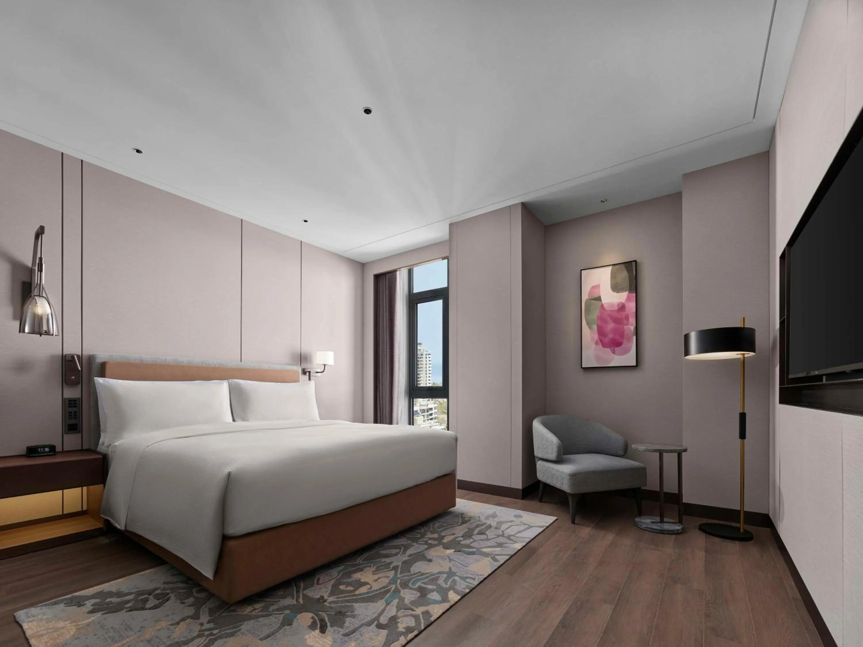 Bed in Doubletree By Hilton Yantai Golden Coast Hotel & Suites