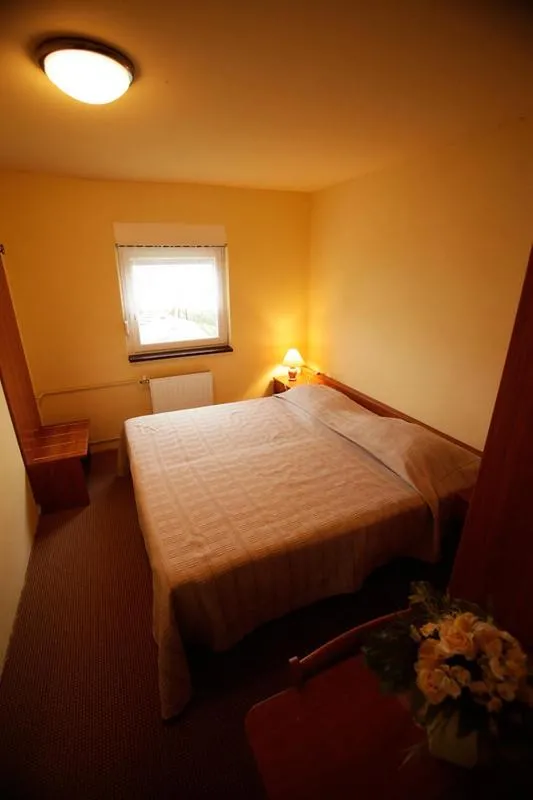 Bed in Tribunia Beach Hotel