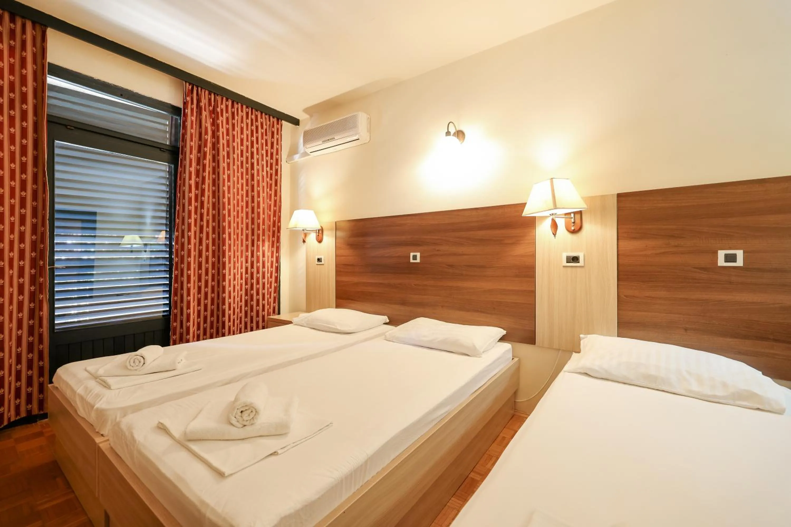 Bed in Tribunia Beach Hotel