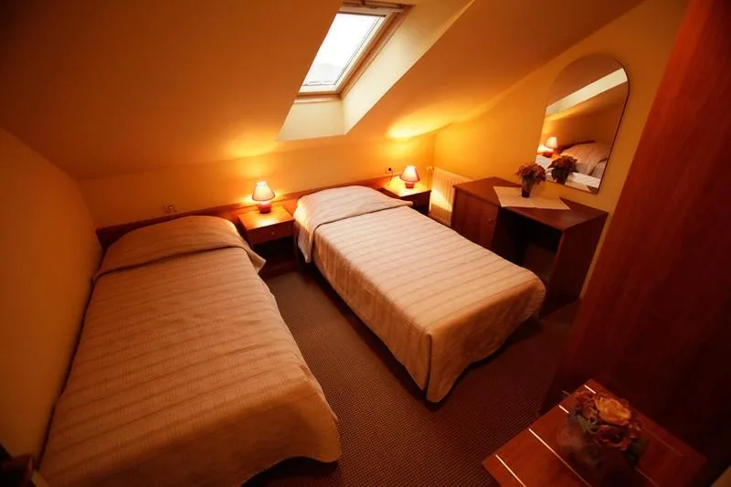 Bed in Tribunia Beach Hotel