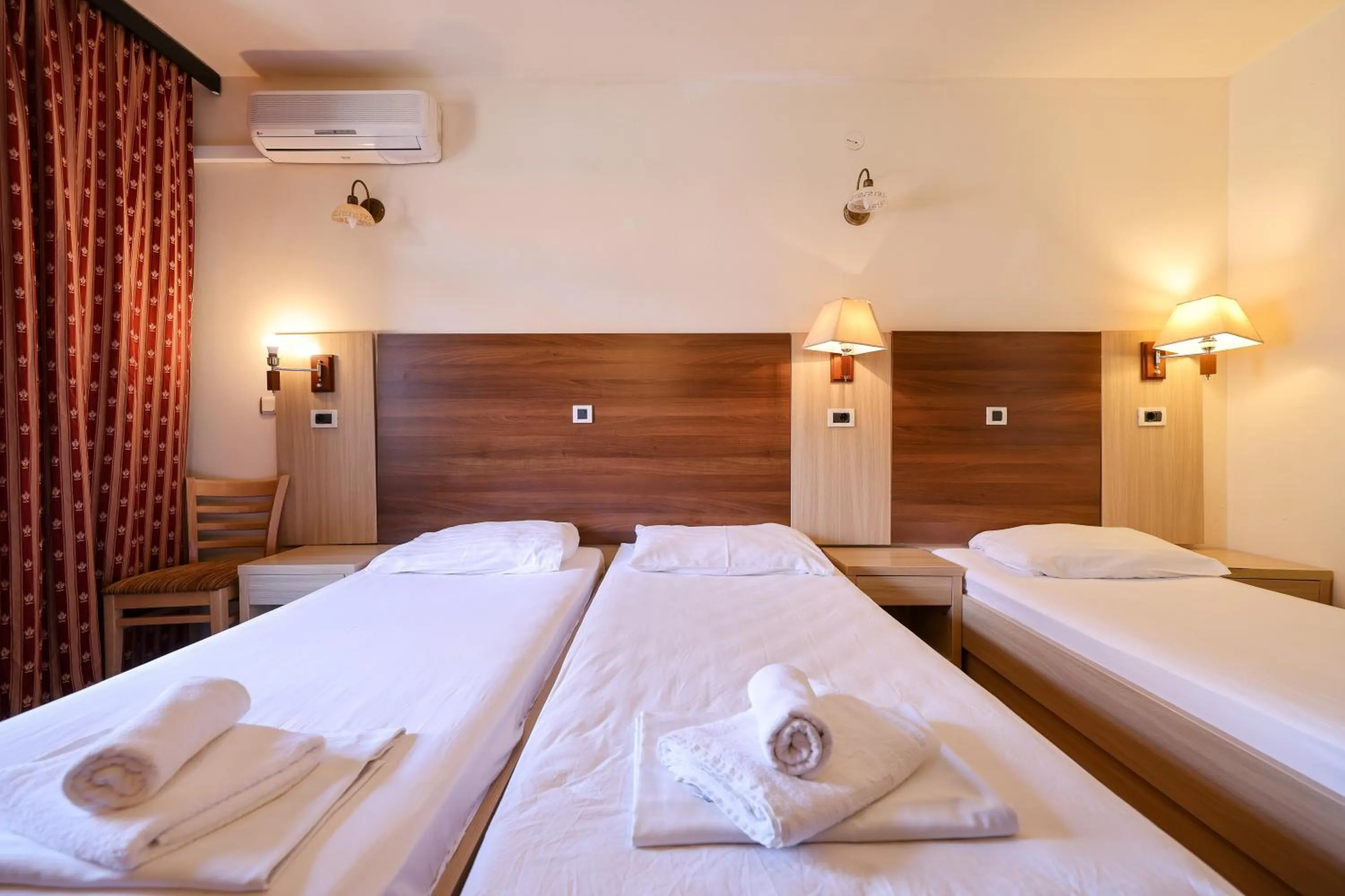 Bed in Tribunia Beach Hotel