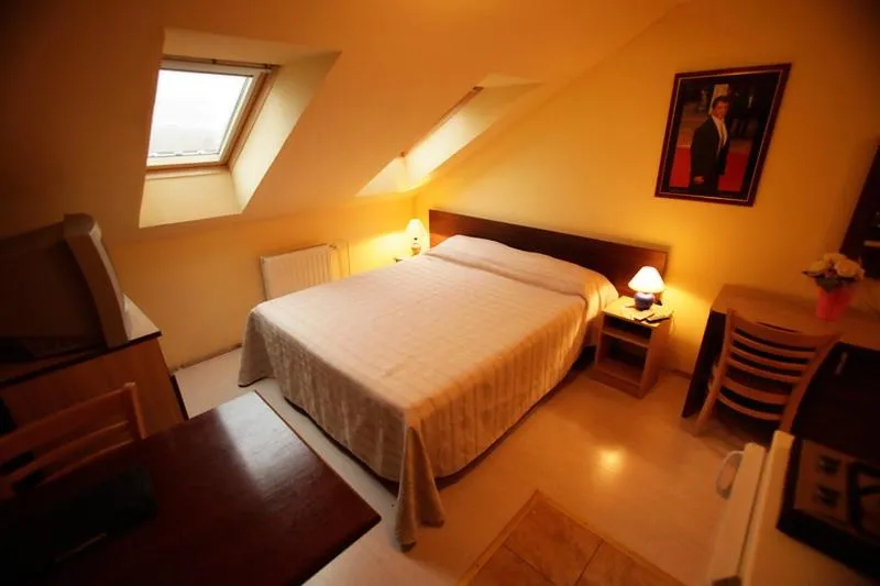 Bed in Tribunia Beach Hotel