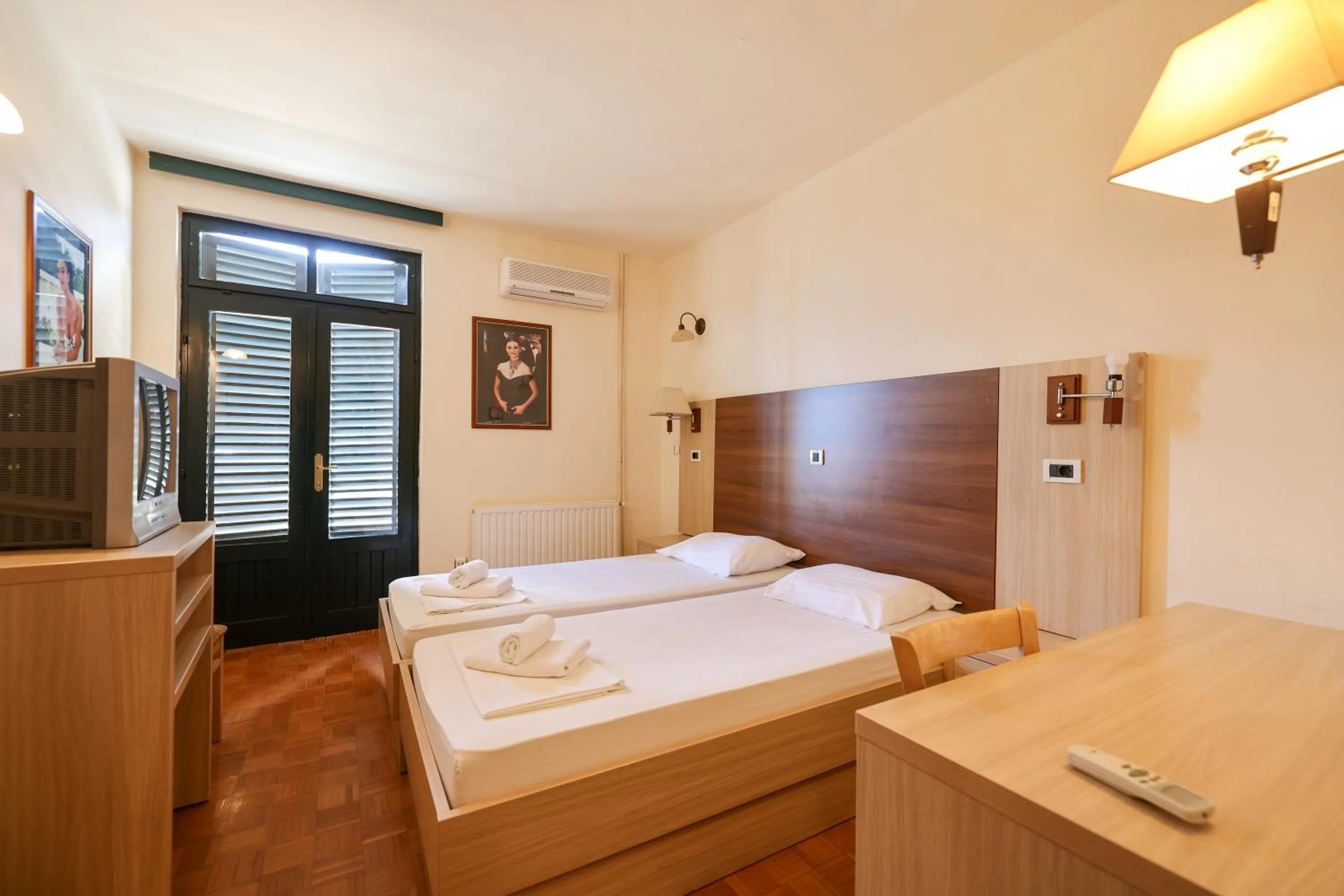 Bed in Tribunia Beach Hotel