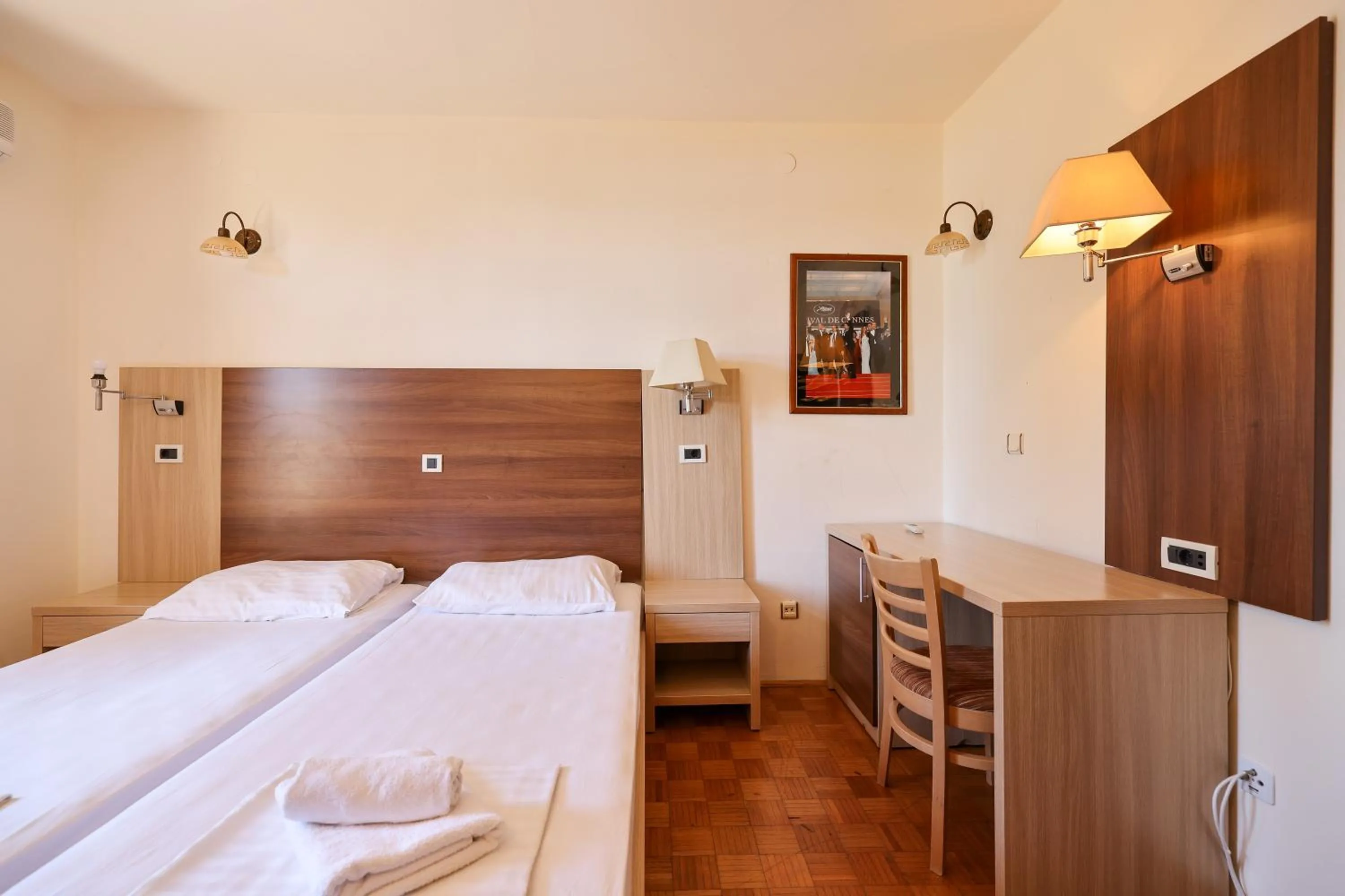 Bed in Tribunia Beach Hotel