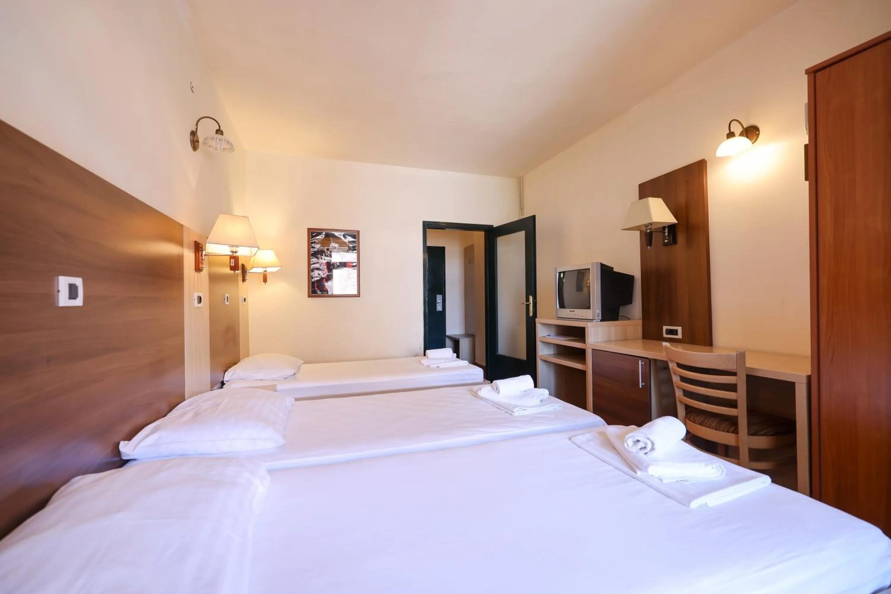 Bed in Tribunia Beach Hotel