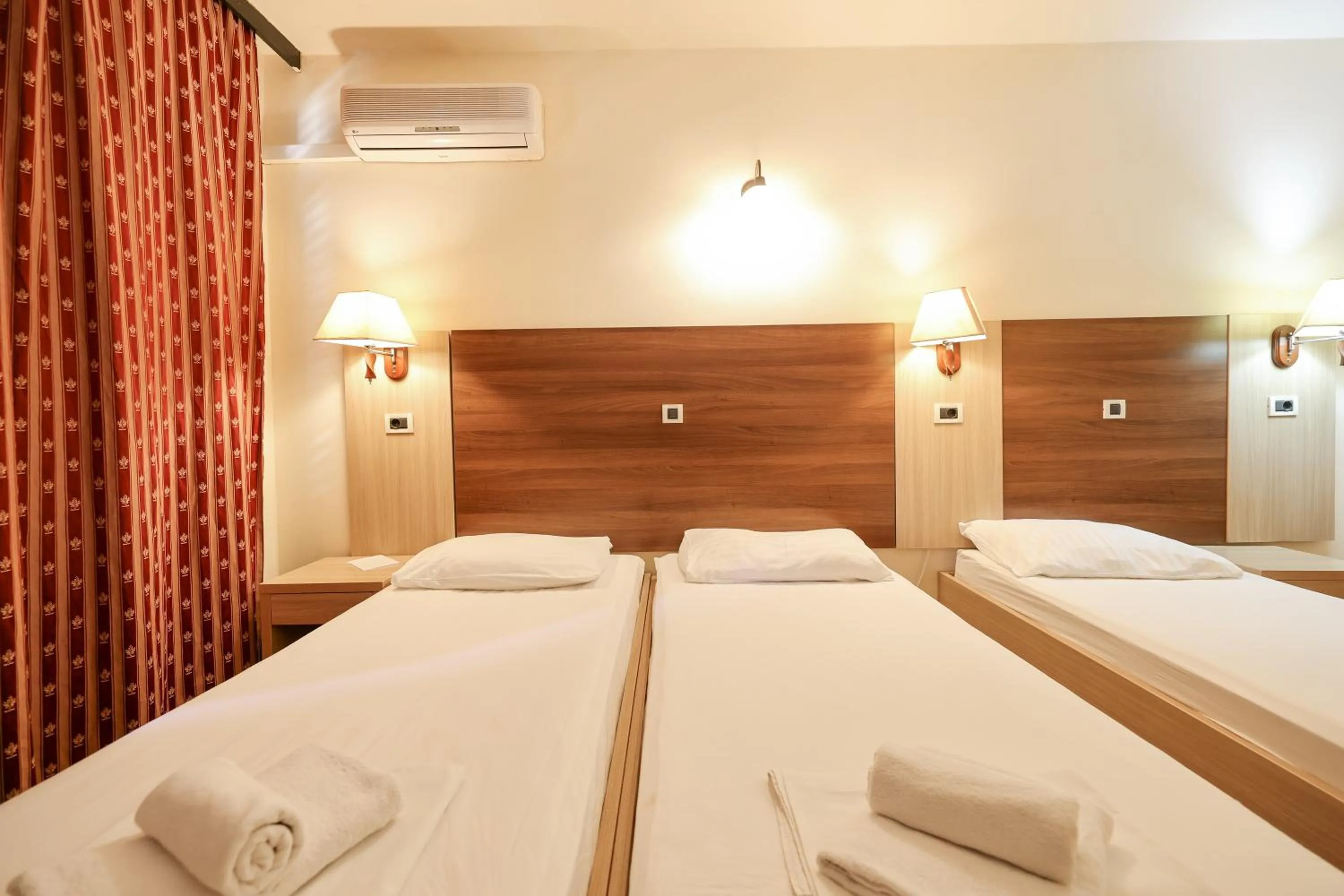 Bed in Tribunia Beach Hotel
